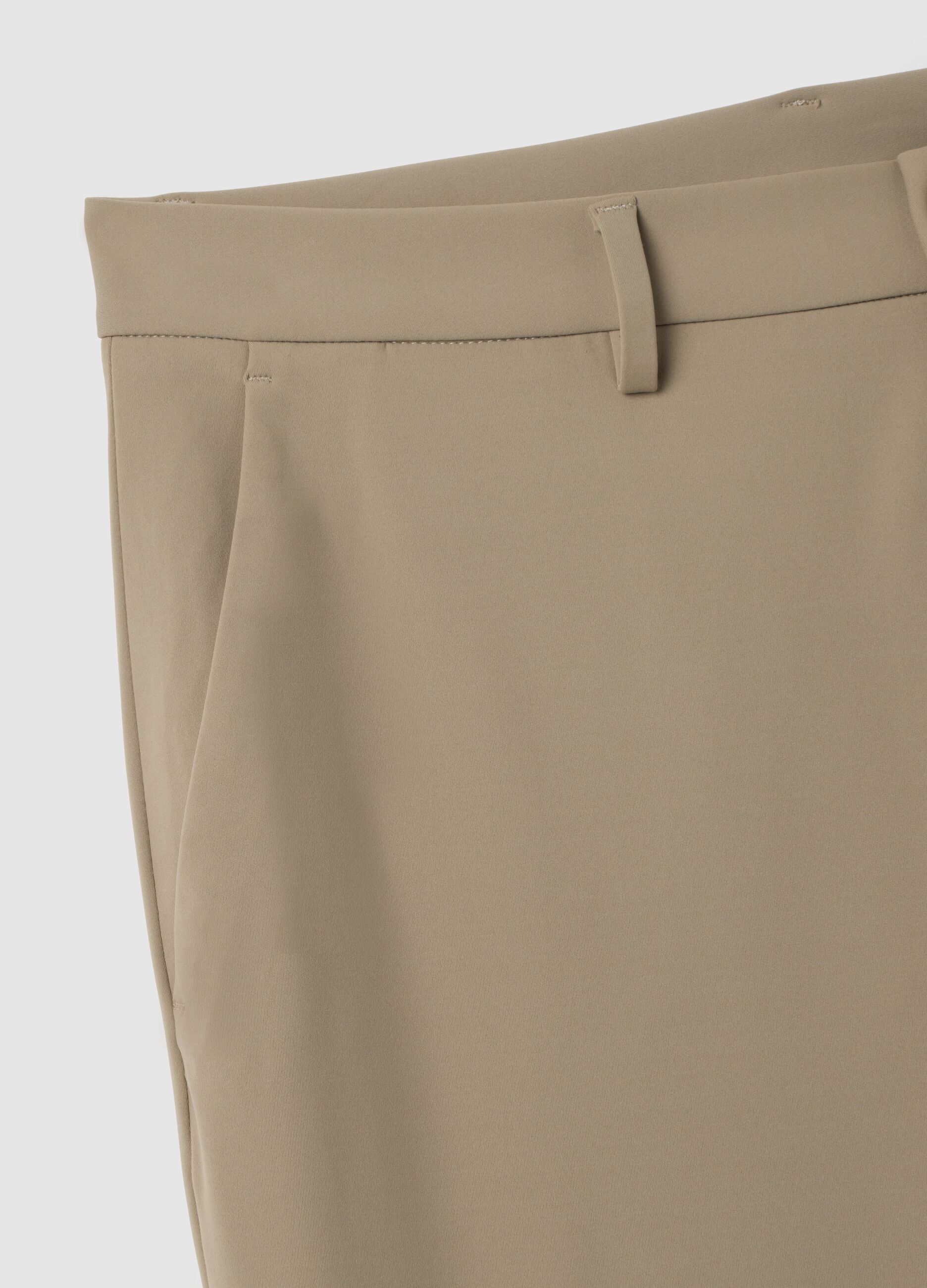 Beige slim fit trousers in stretch fabric