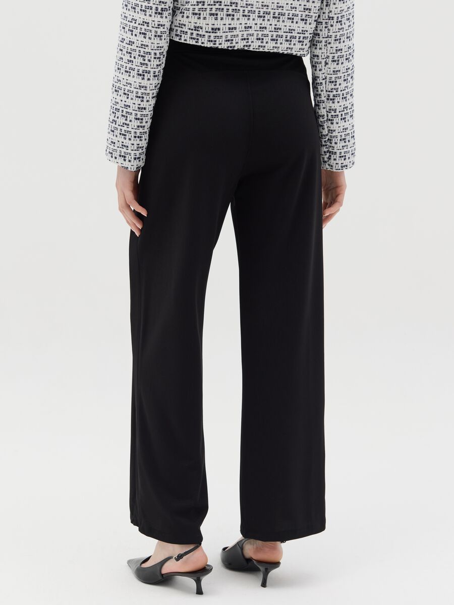 Black palazzo trousers with pockets_3