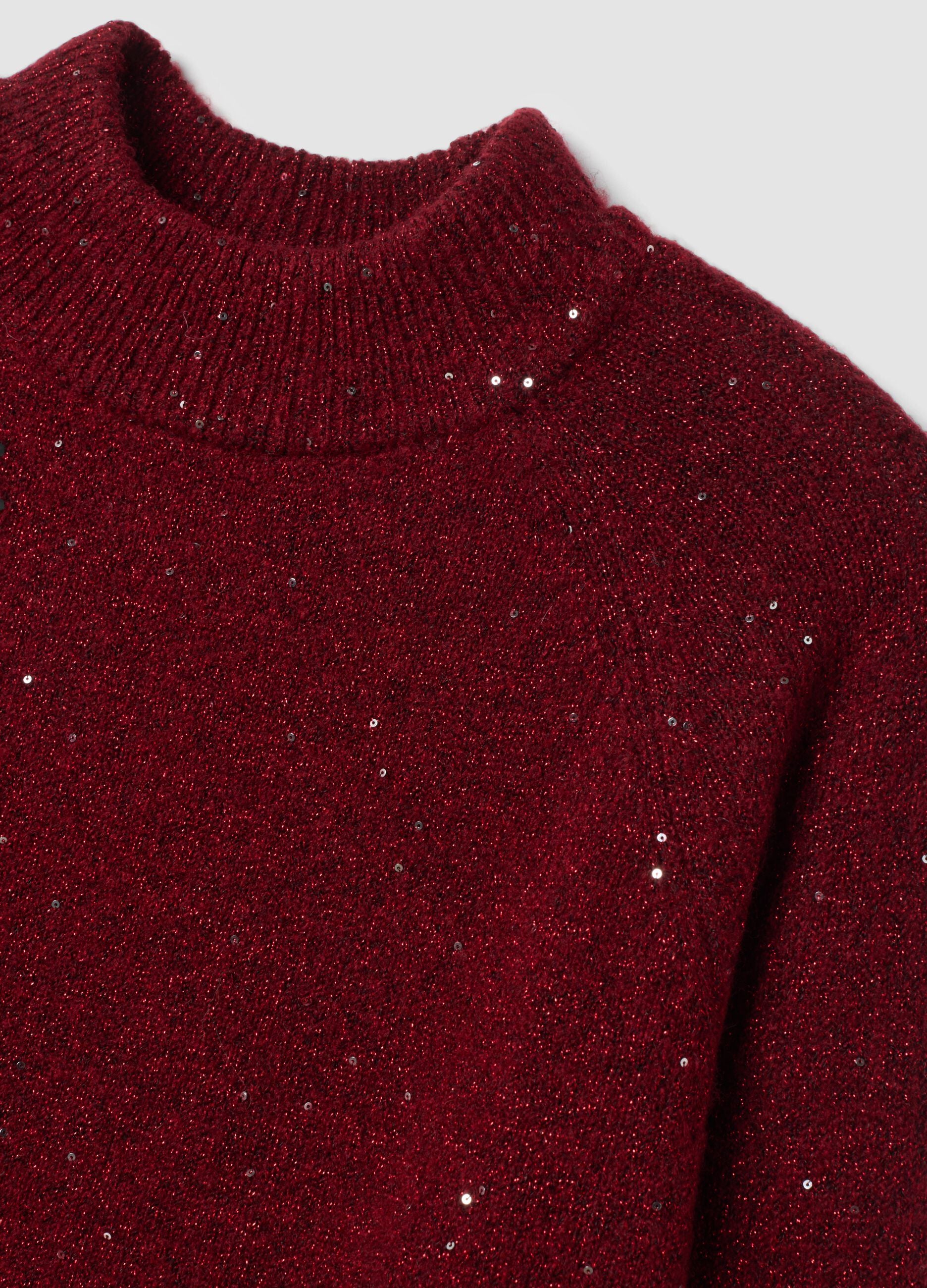 Red stretch top with high neck and sequins