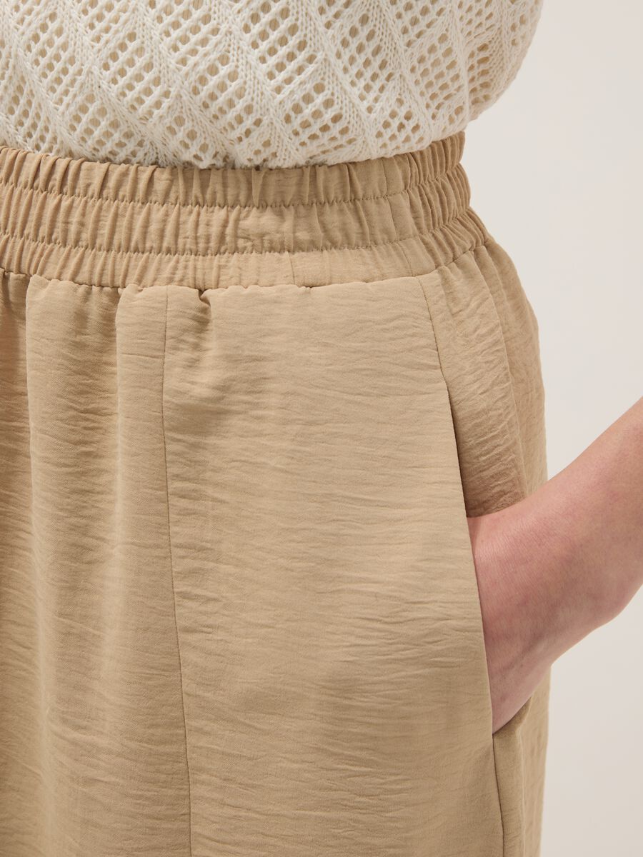 Beige long skirt, regular fit with elasticated waist and slit_3