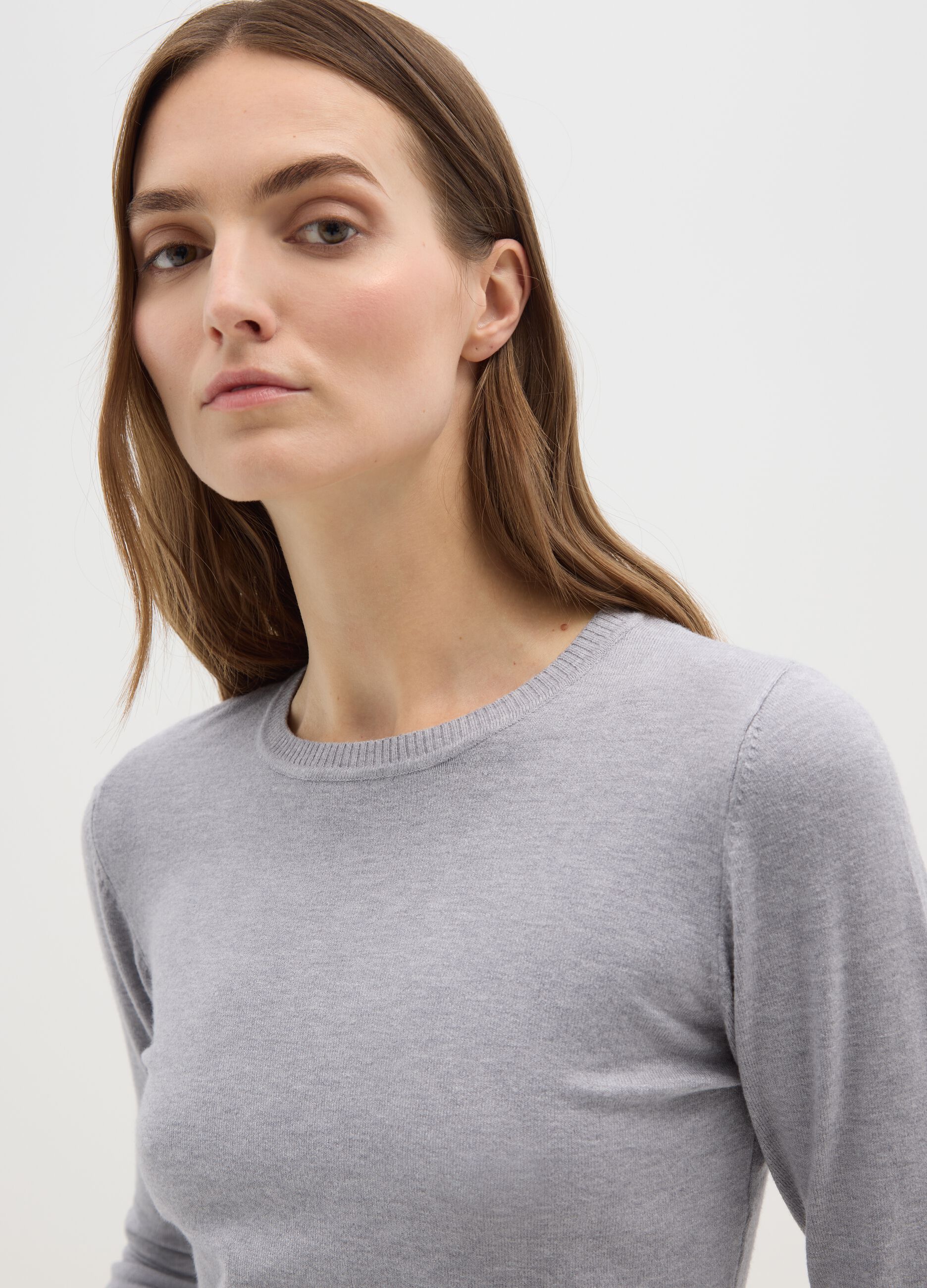 Grey crew neck jumper with long sleeves