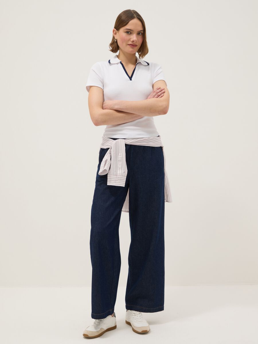 Polo in cotone elasticizzato bianca regular fit con collo a contrasto_1