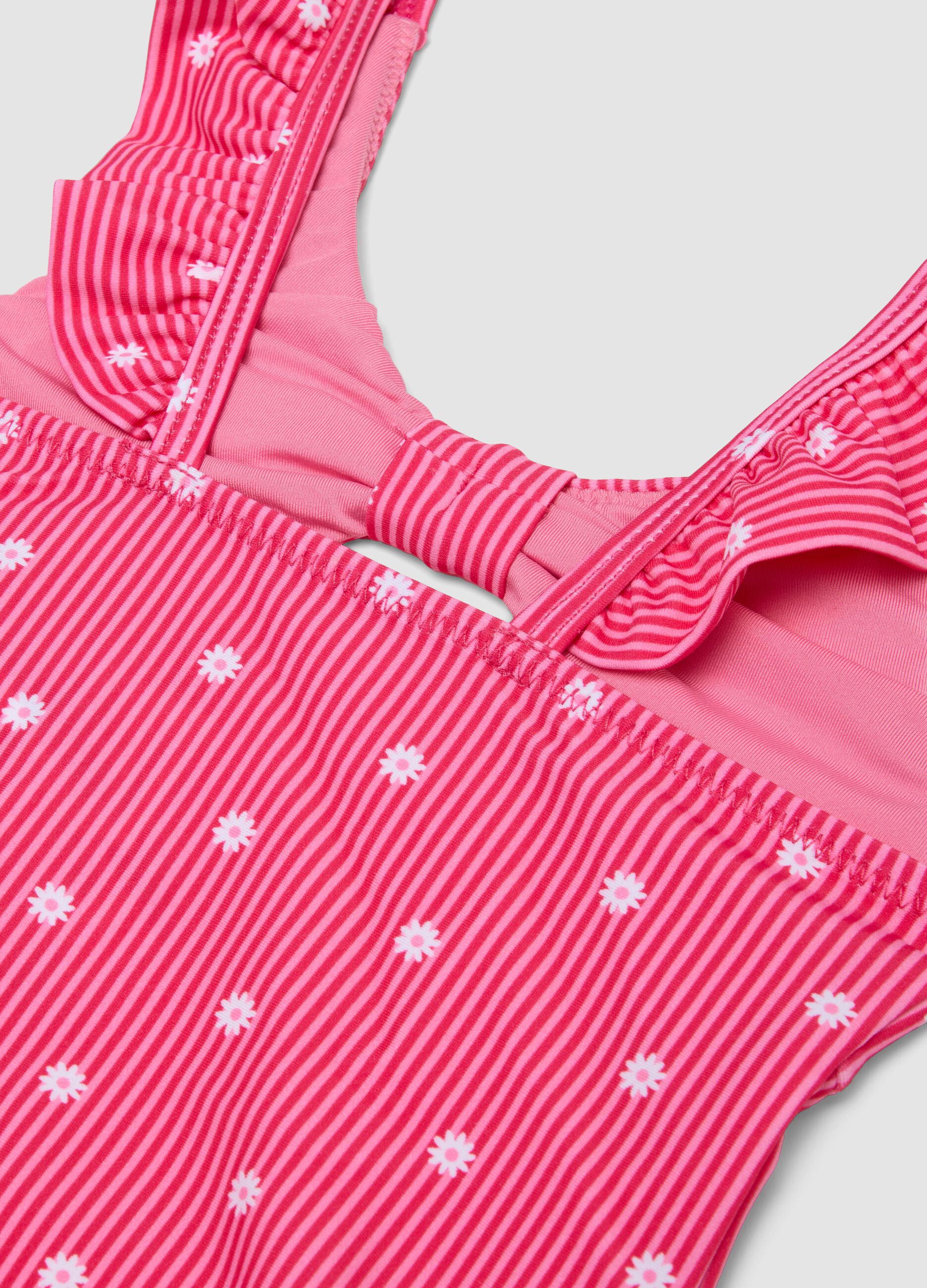 Pink striped stretch swimsuit with ruffle straps