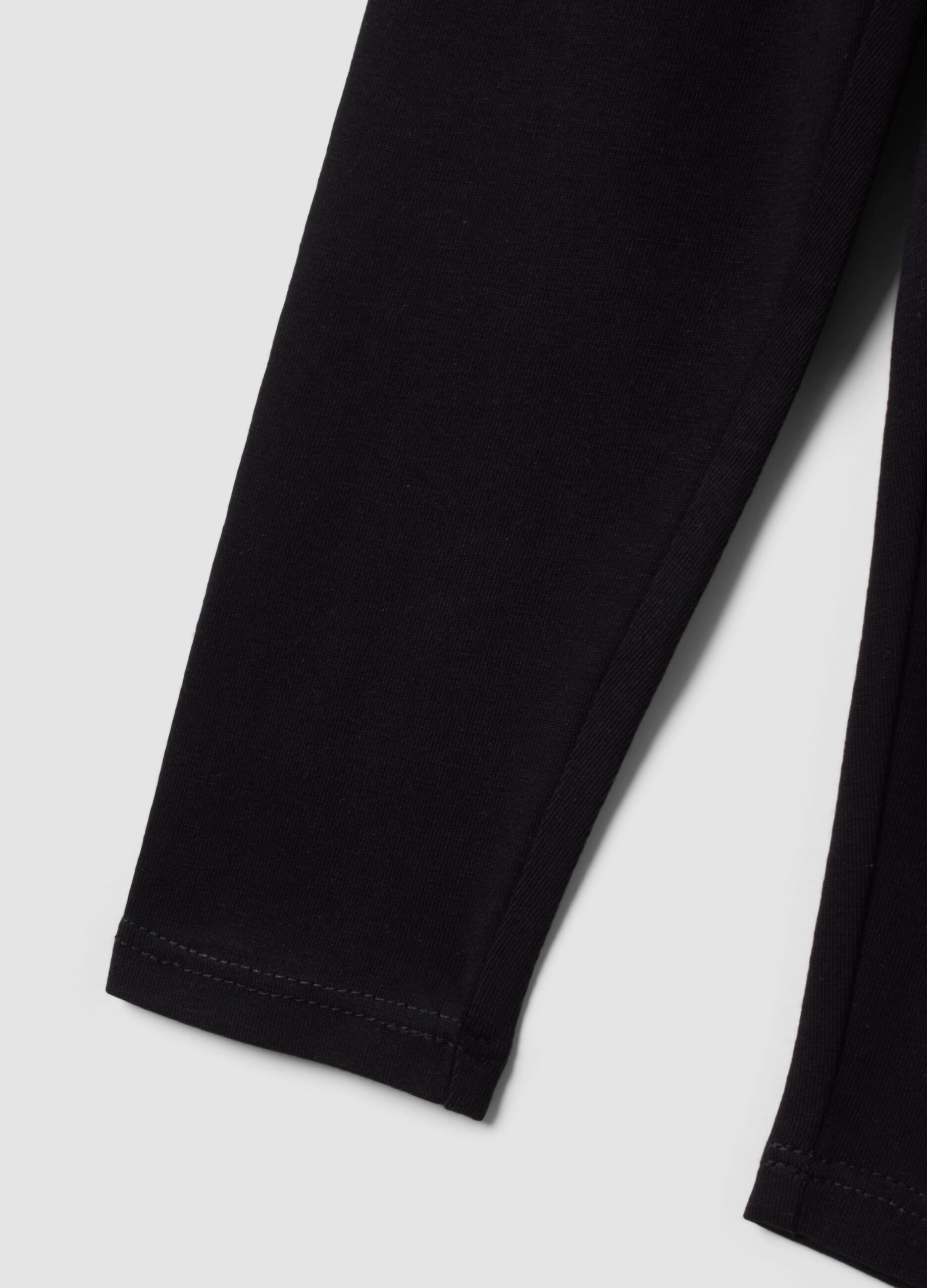 Leggings neri in cotone organico elasticizzato slim fit per bimba