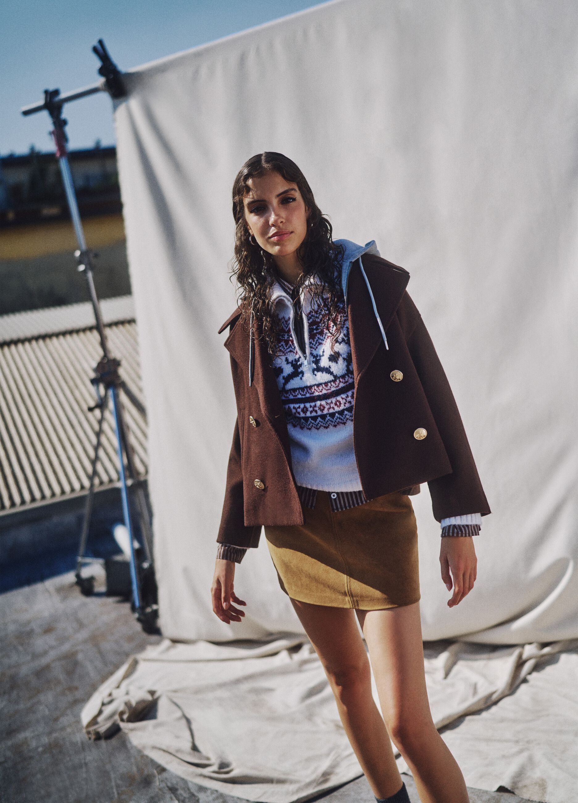 White jumper with multicolour jacquard pattern and zipper