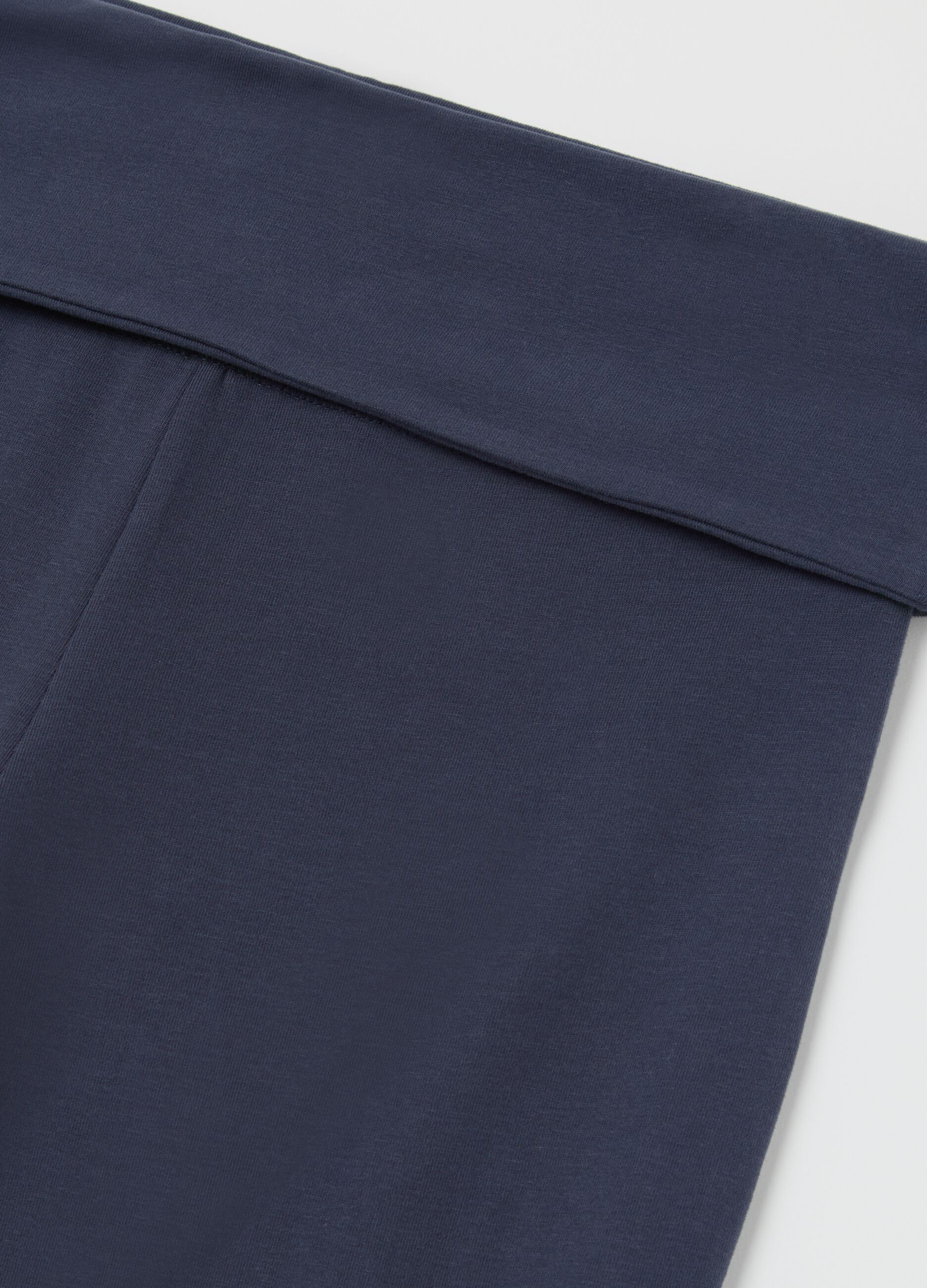 Blue flare-fit leggings with striped fold at the waist
