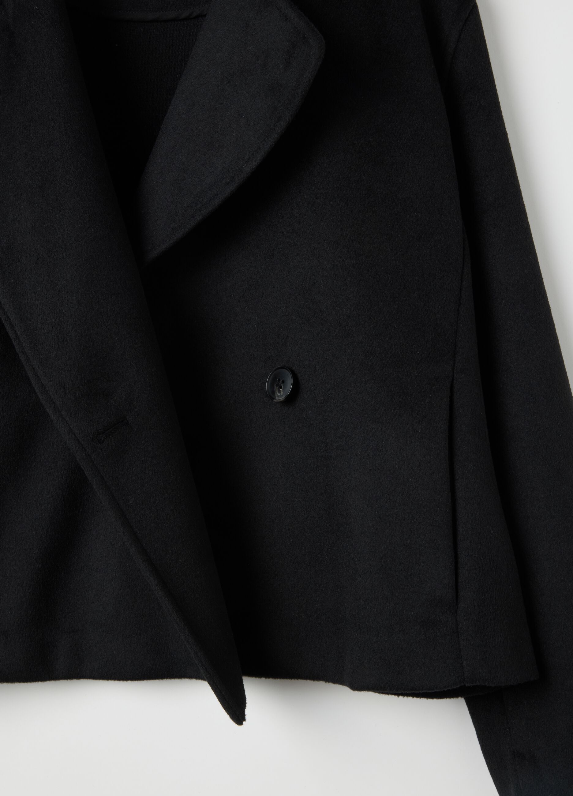 Black double-breasted coat with buttons