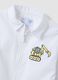 White nursery apron with zip and dinosaur embroidery for boys_2
