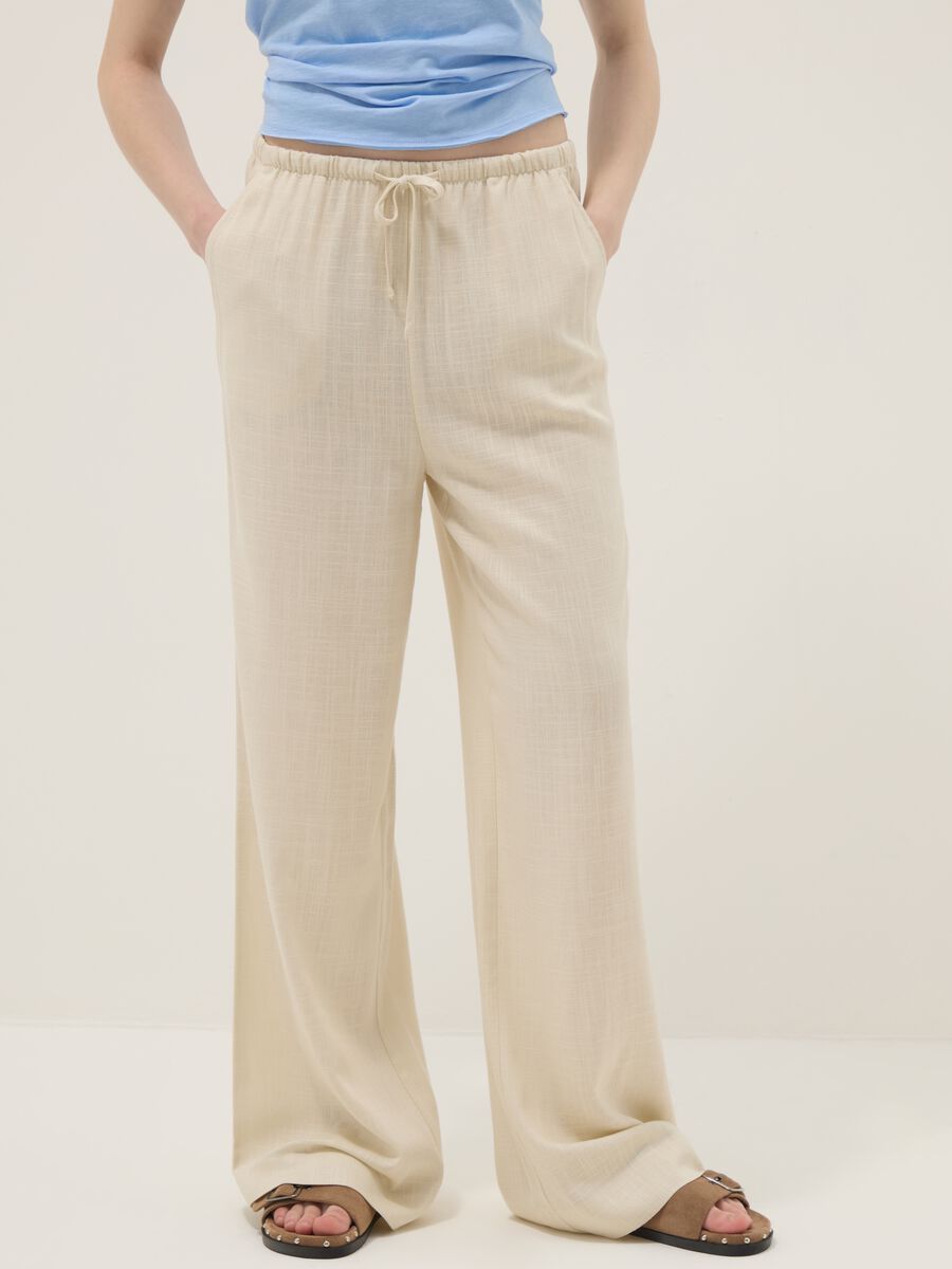 Beige viscose and linen-blend relaxed-fit jogger trousers_1