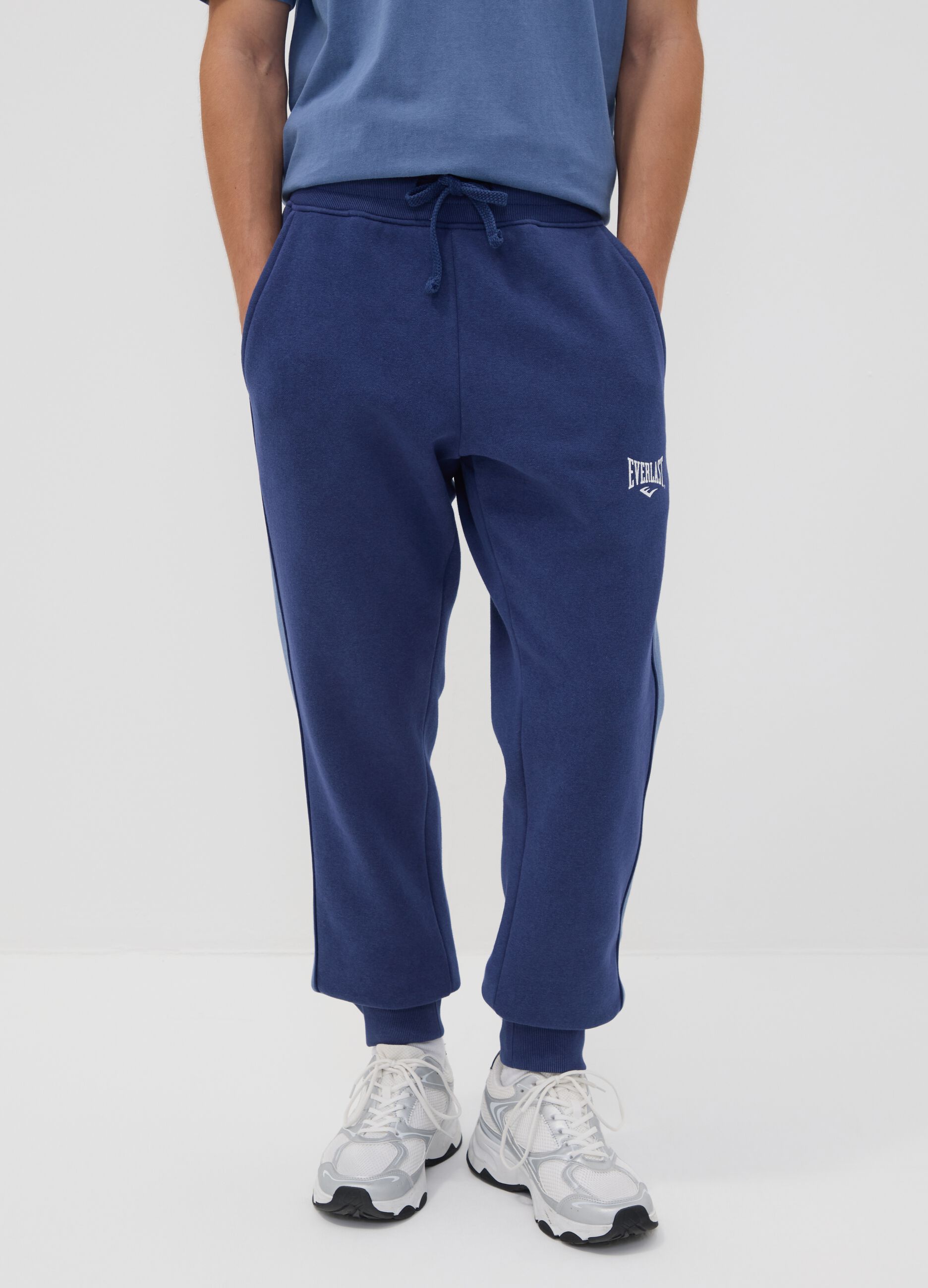 Blue cotton-blend joggers with print