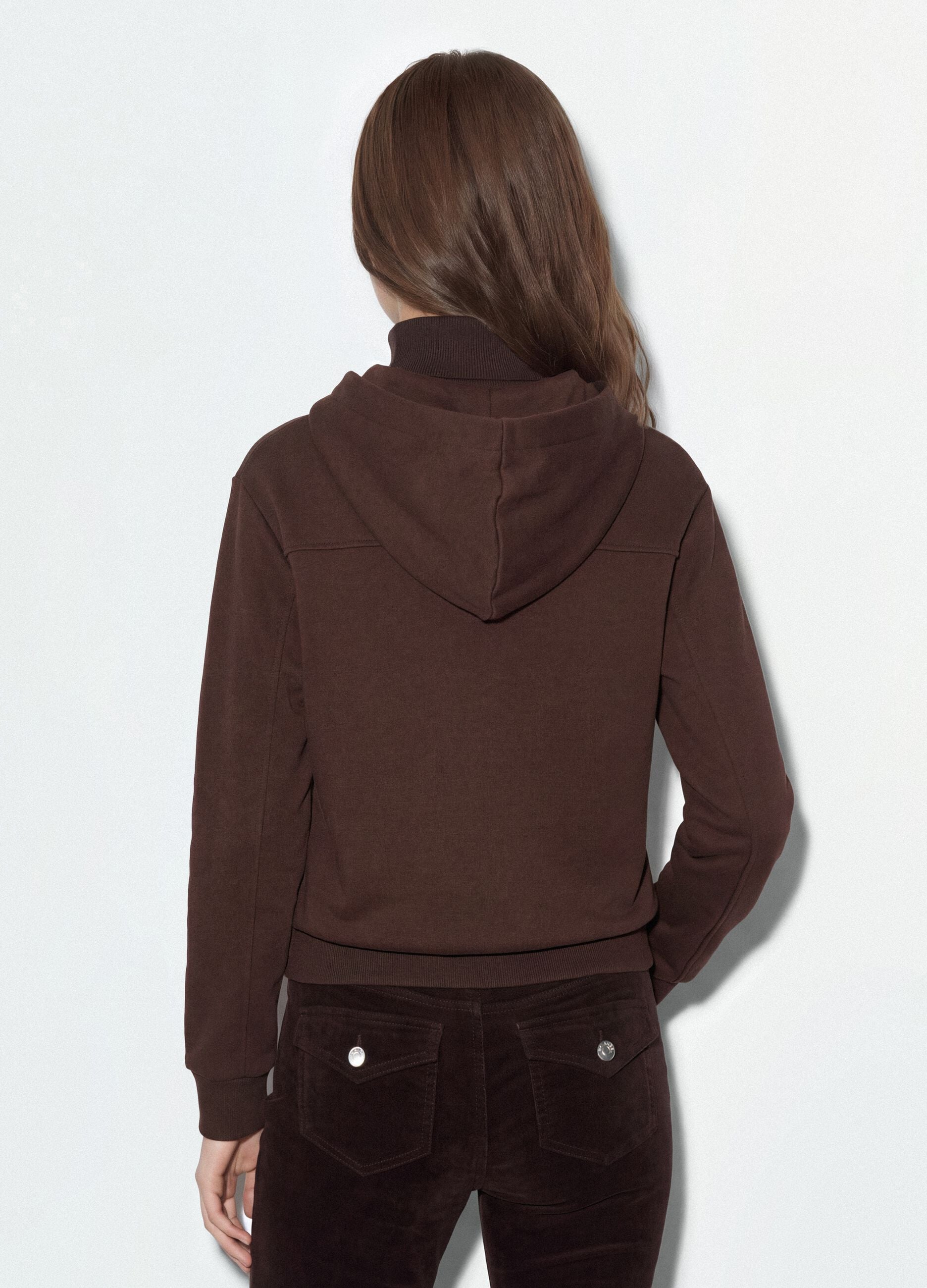 Brown hoodie with tied drawstring, relaxed fit