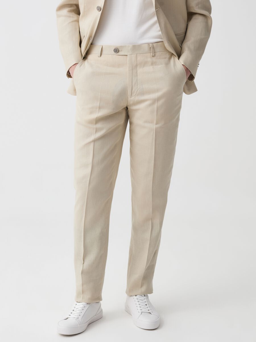 Slim-fit trousers in solid colour linen_1