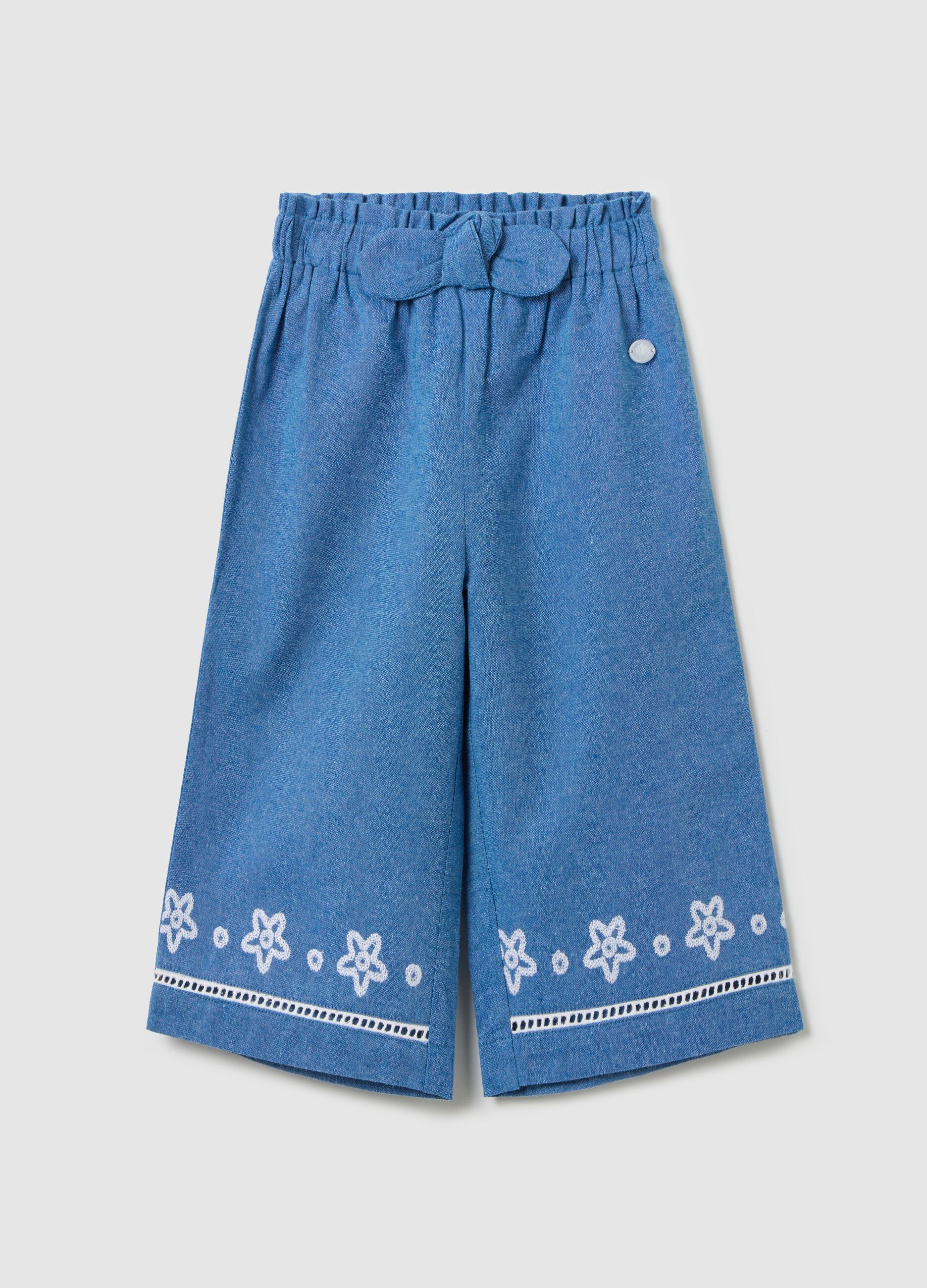 Wide-leg trousers in blue chambray with floral embroidery