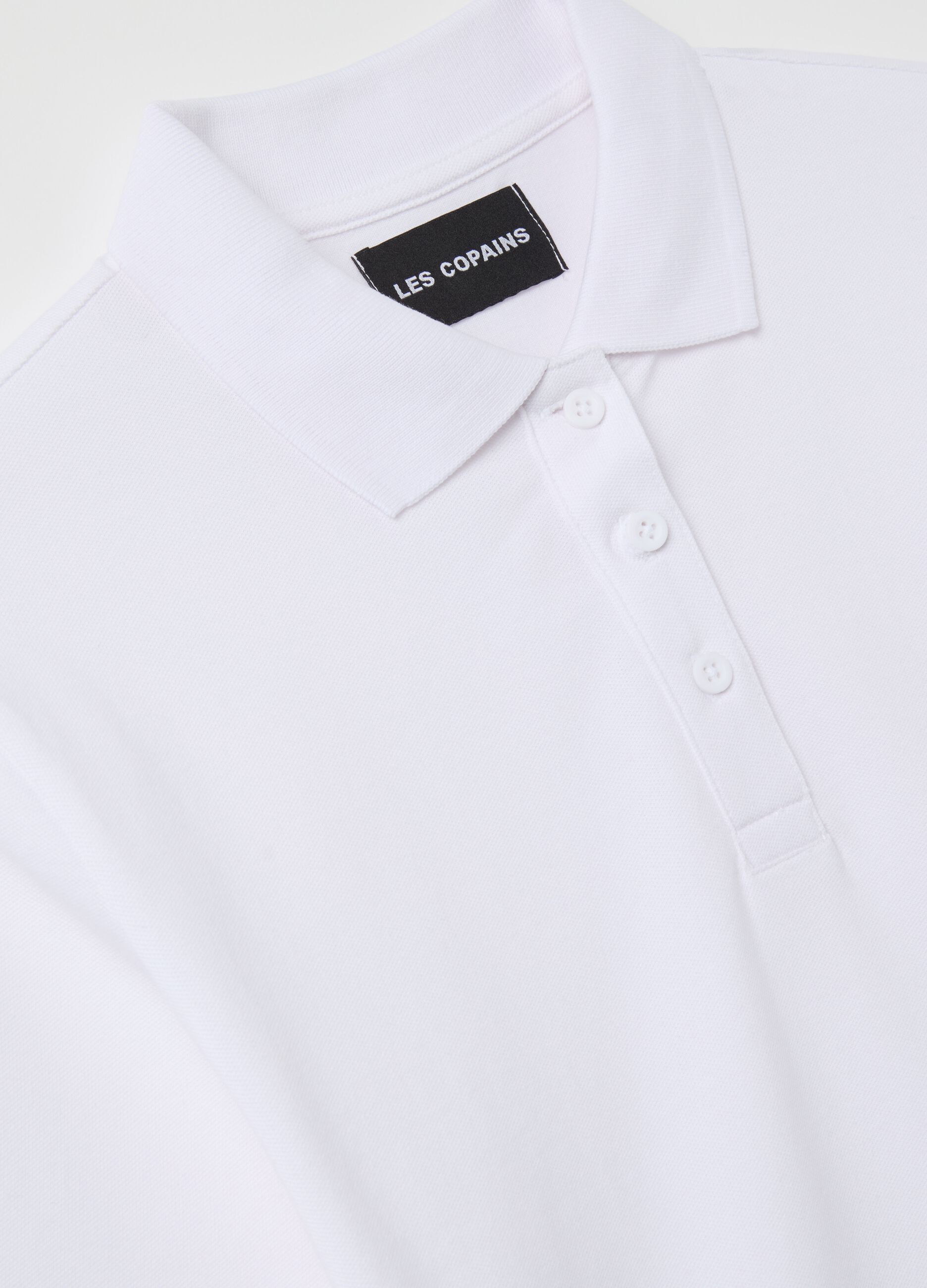 Polo shirt in solid colour piquet
