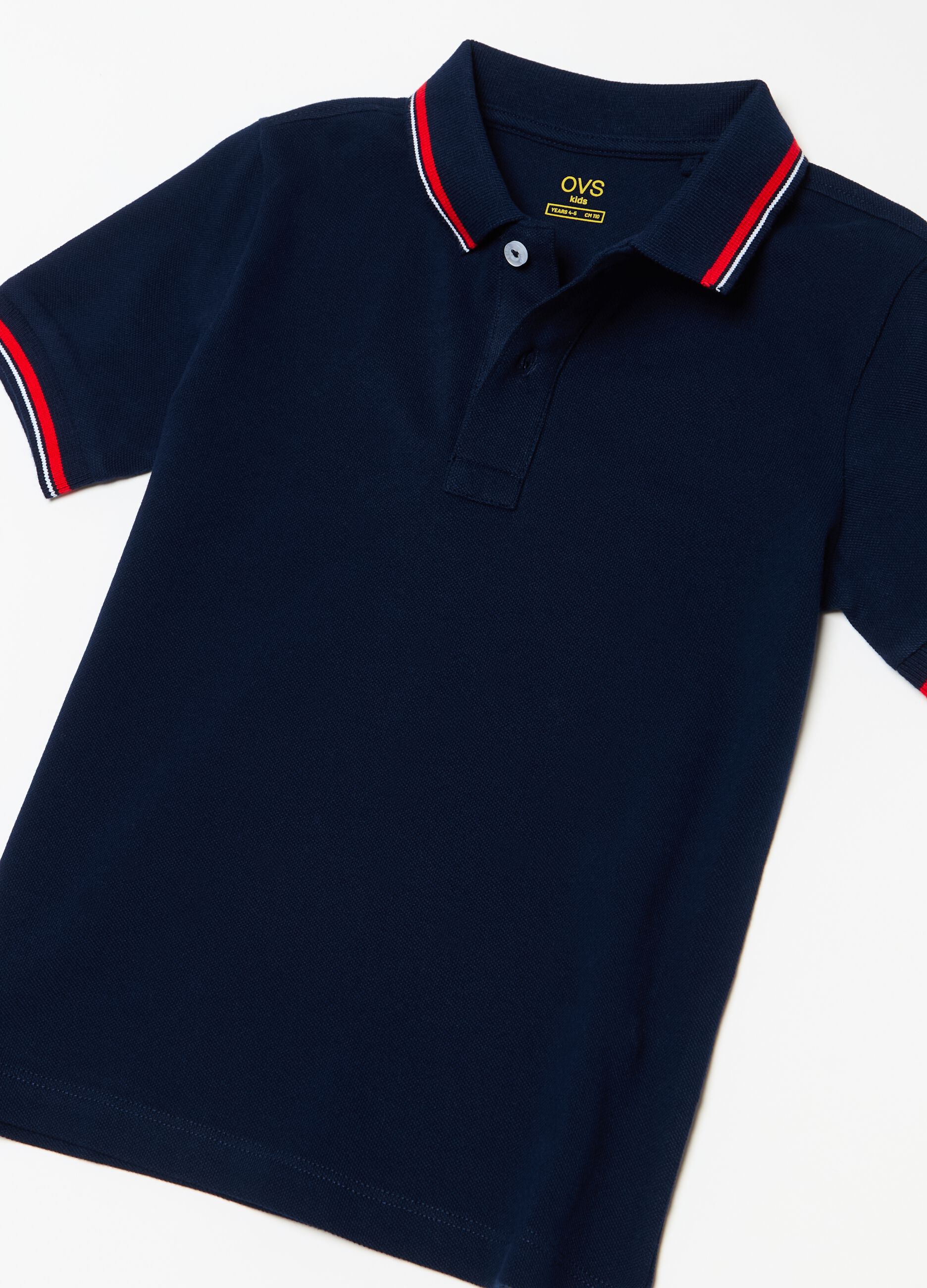 Polo shirt in piquet with striped detail