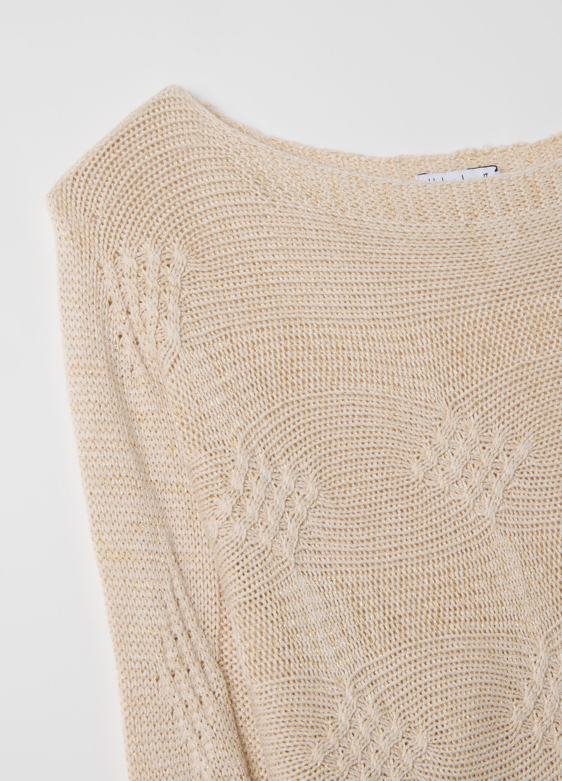 Beige long-sleeved top with design
