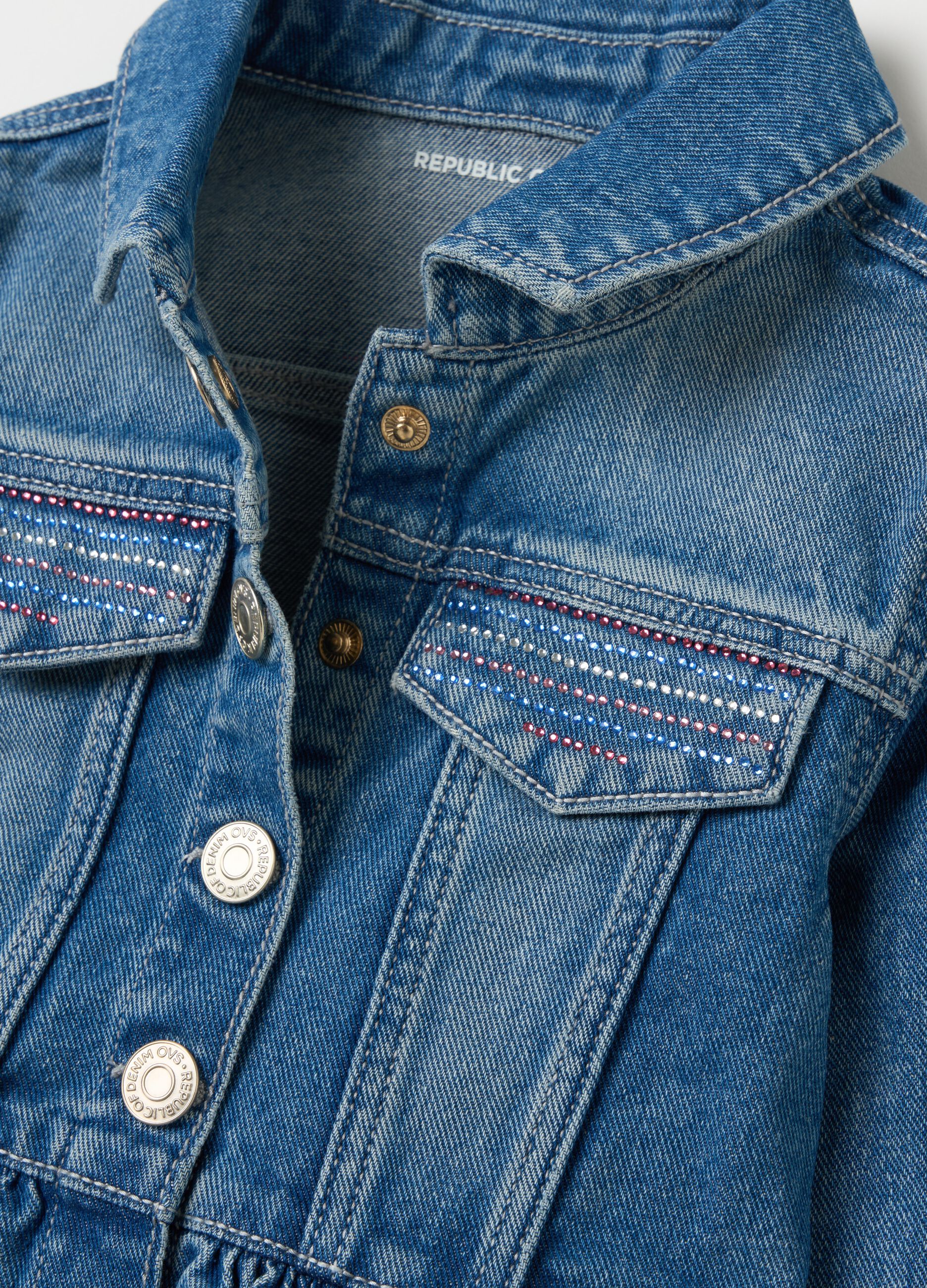 Giacca in denim con balza 