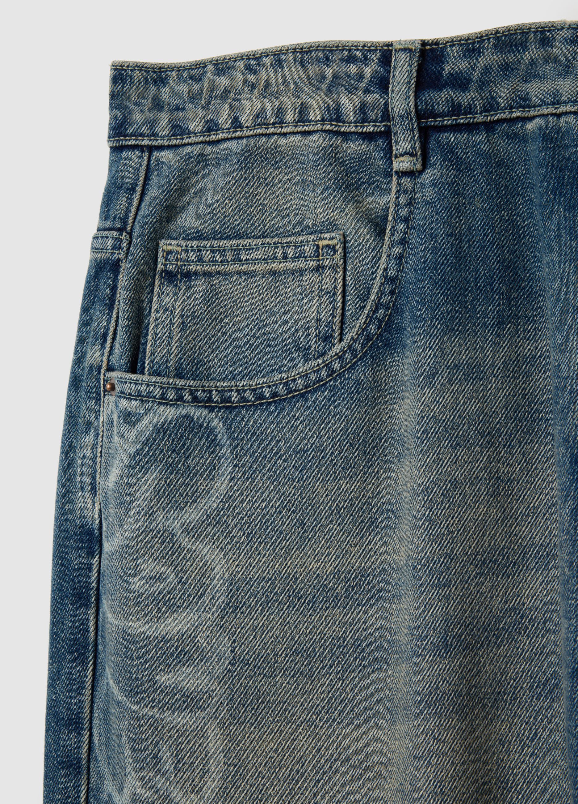 Low-rise blue jeans in pure cotton denim