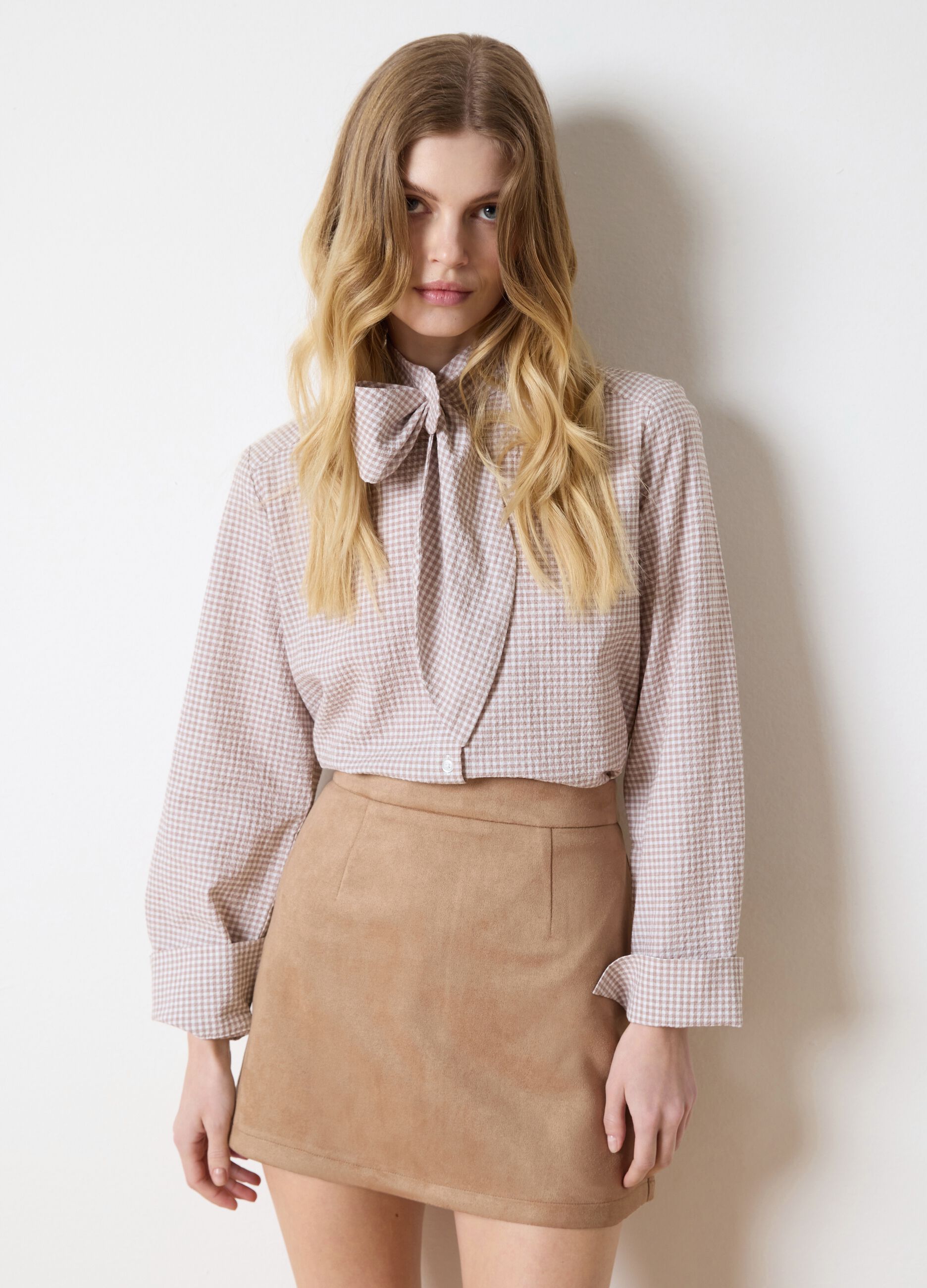 Beige suede miniskirt
