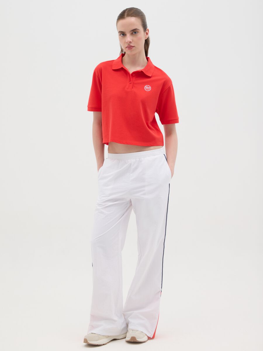 Women's red pure cotton polo with classic collar and embroidered logo in regular fit_1