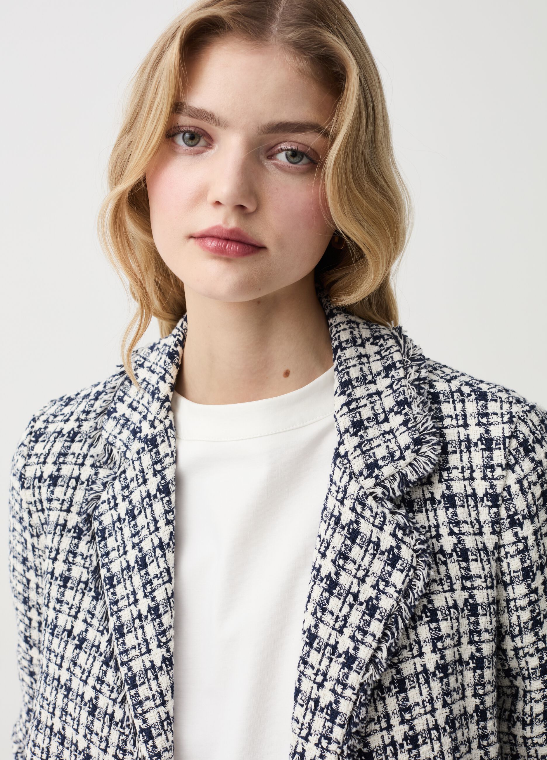 Open blazer with fringing in check tweed