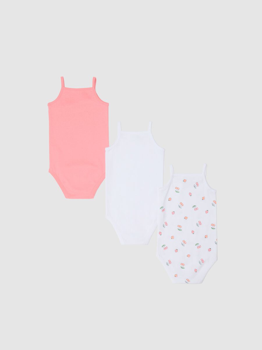 Three-pack sleeveless pink and white bodysuits in organic cotton with print_1