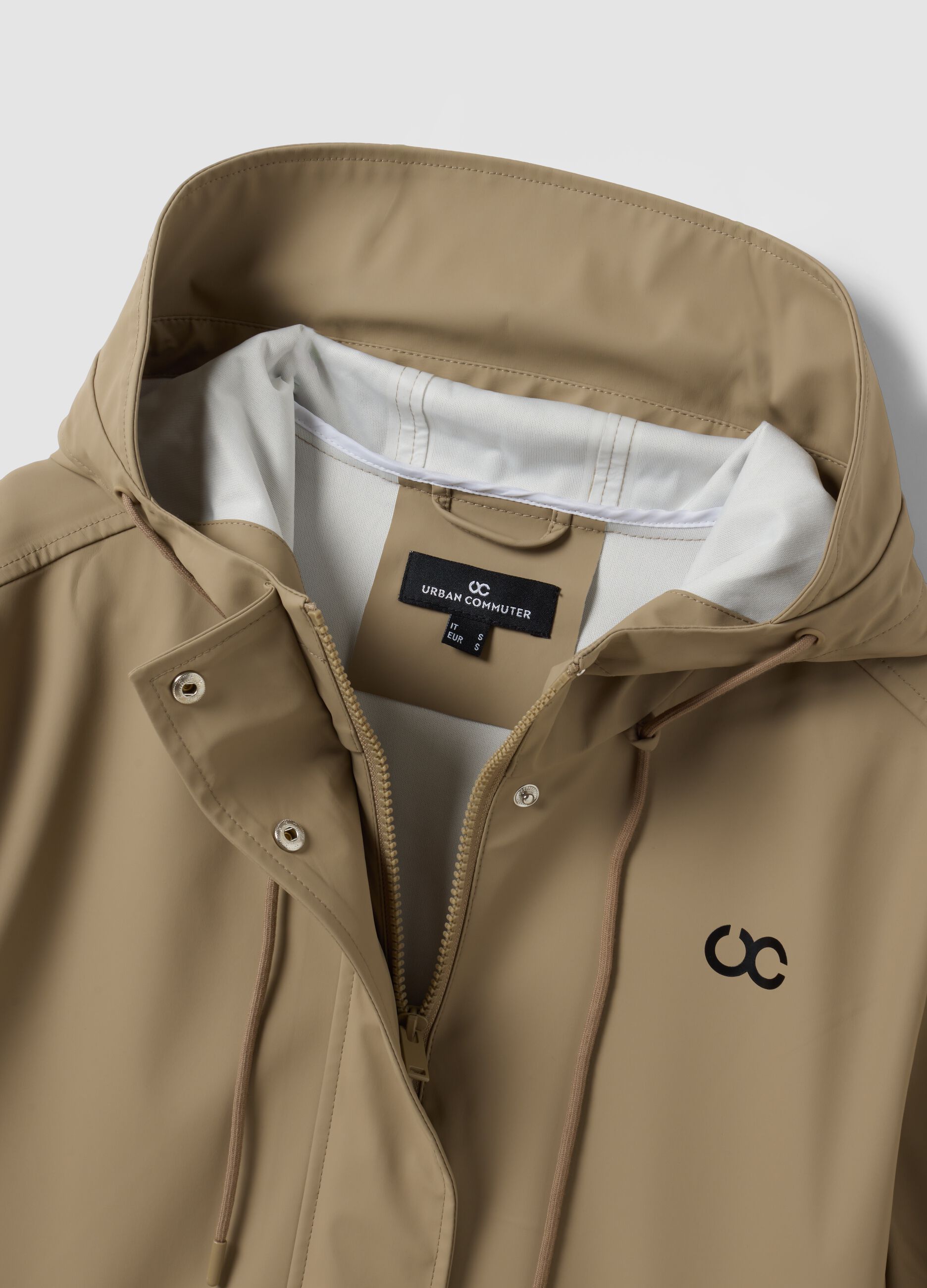 Giacca lunga beige con cappuccio e zip