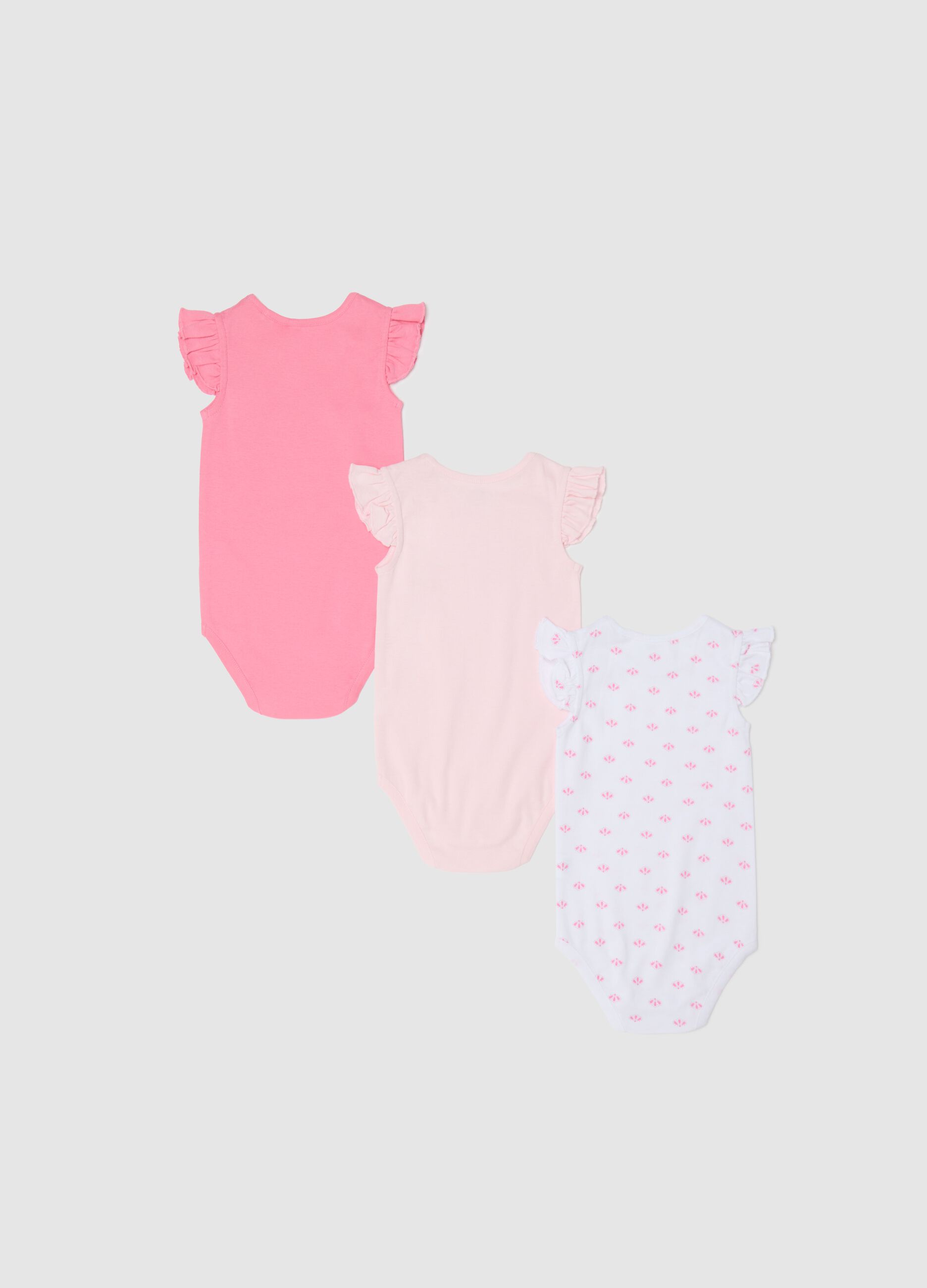 Three-pack white and pink bodysuits in organic cotton with cap sleeves