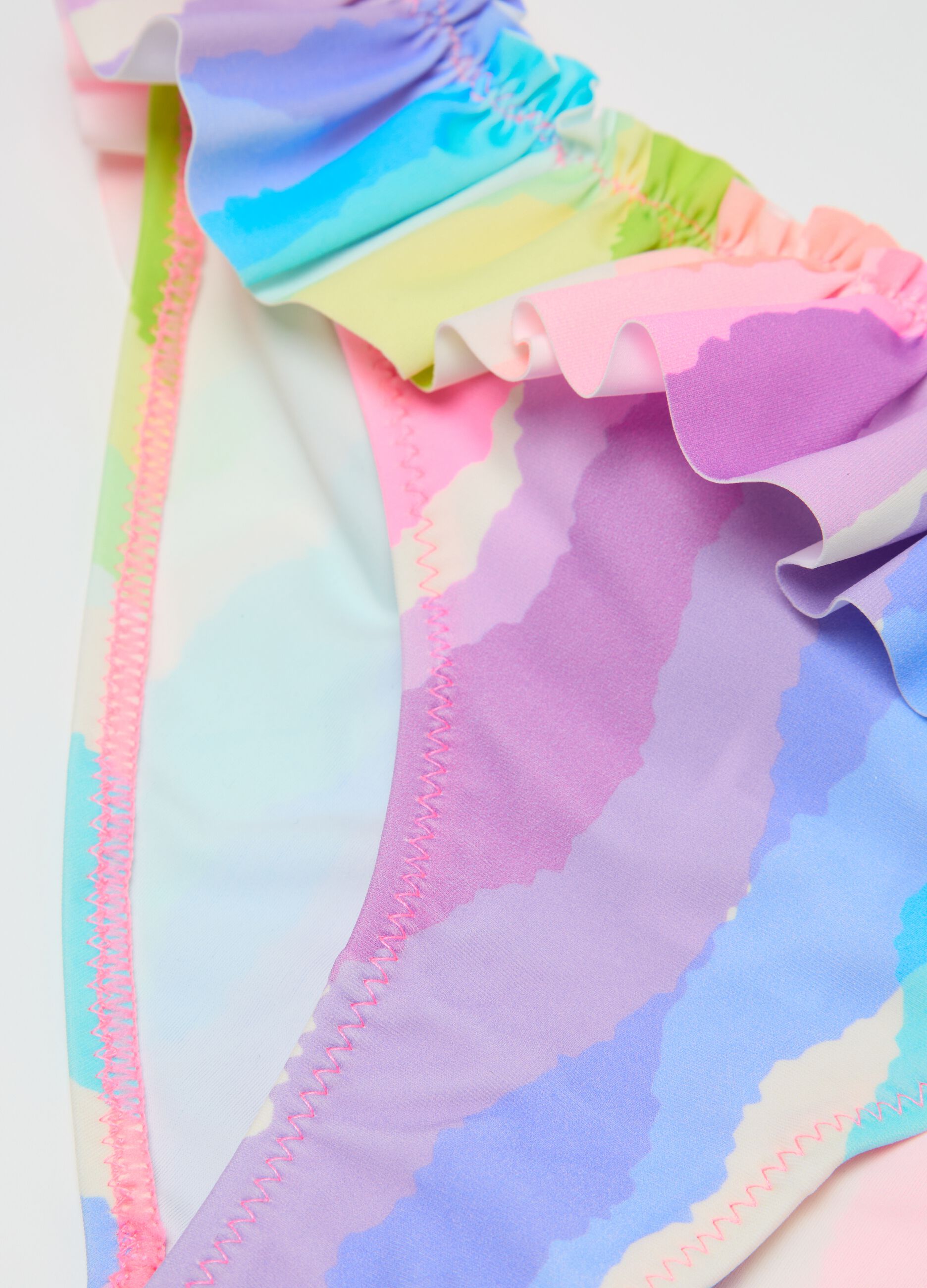 Girls’ swim briefs in multicoloured stretch fabric with frill