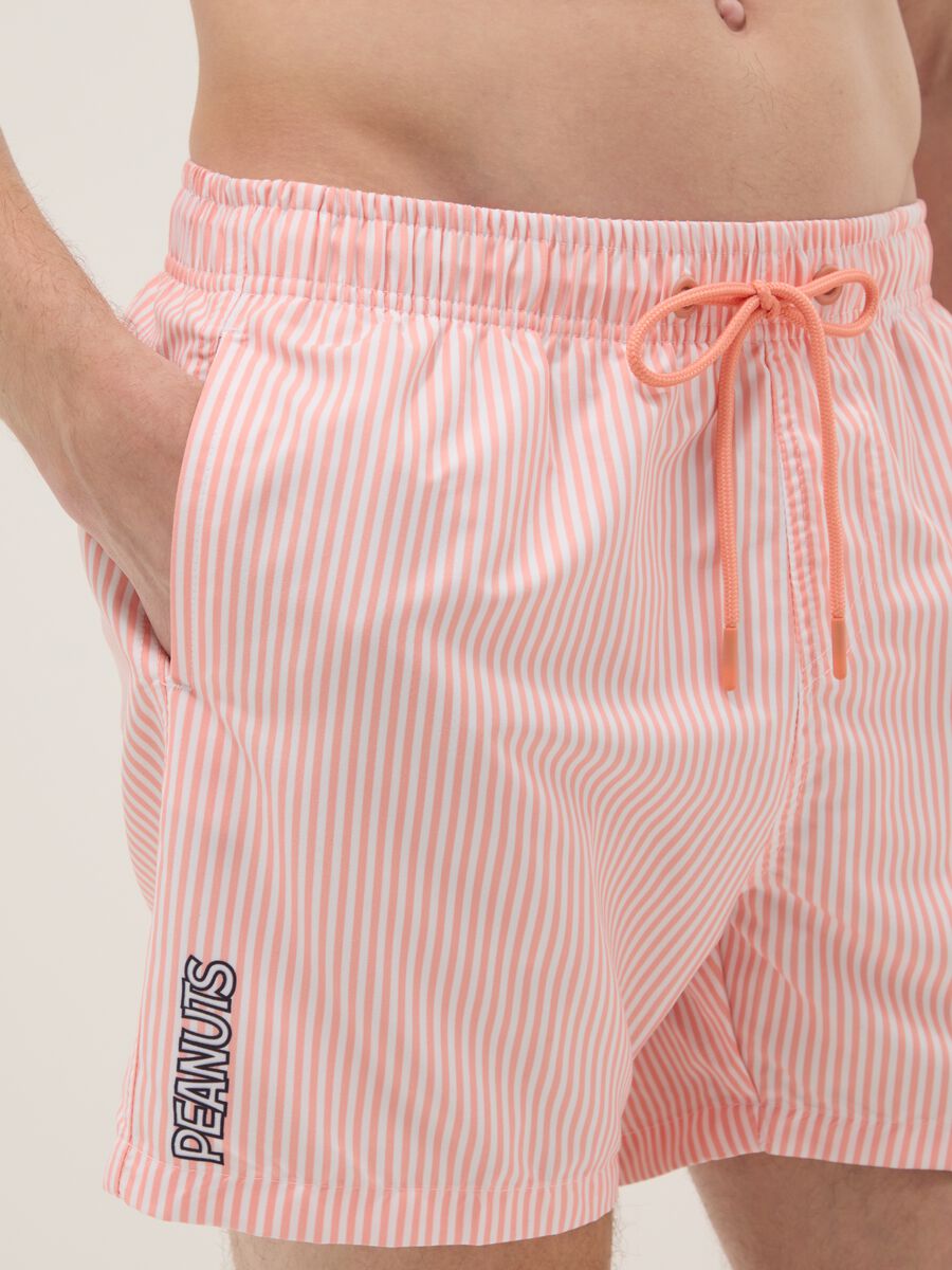 White and pink striped swim trunks with Peanuts print_3