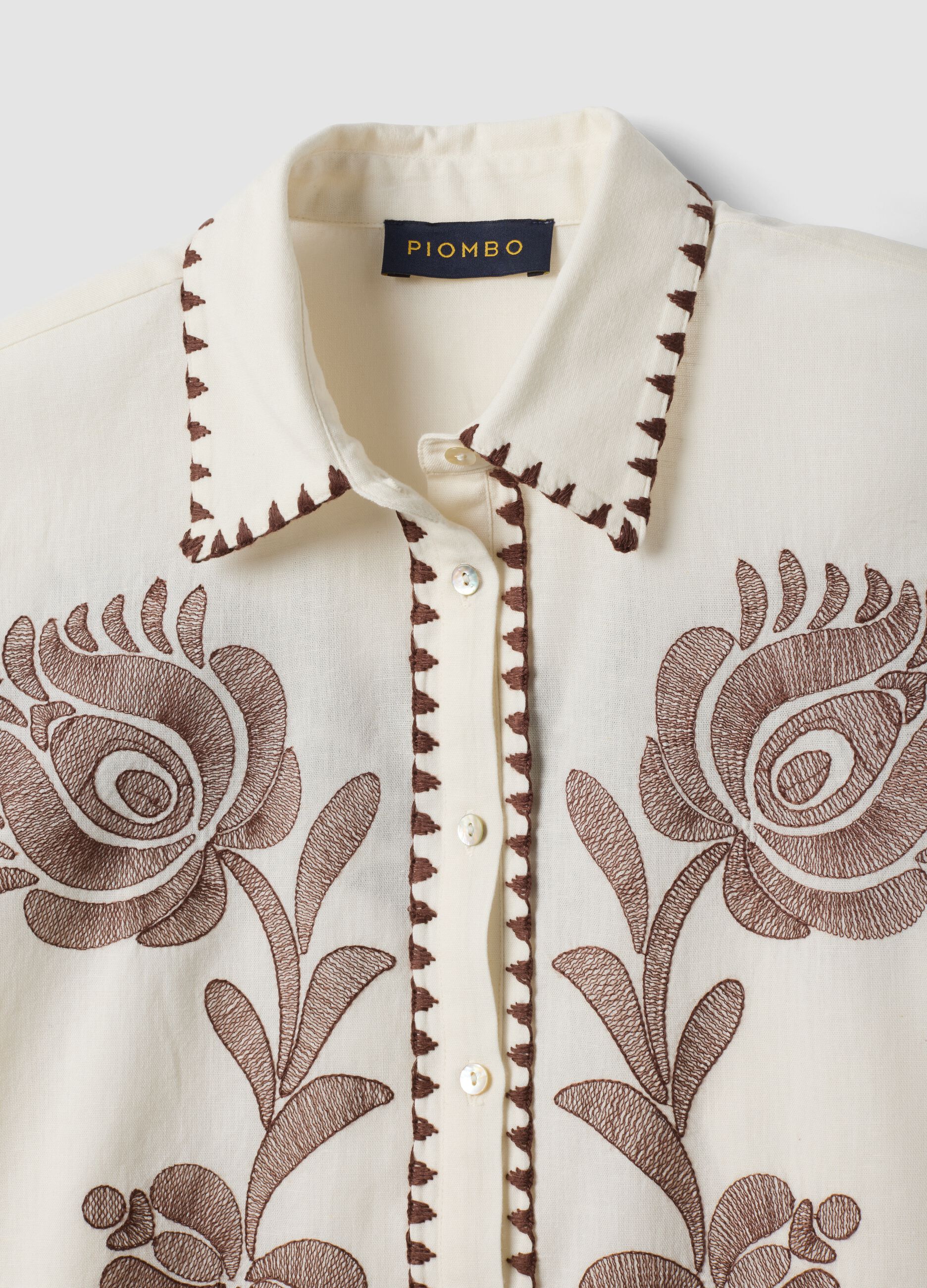 White cotton-linen blend shirt with floral embroidery