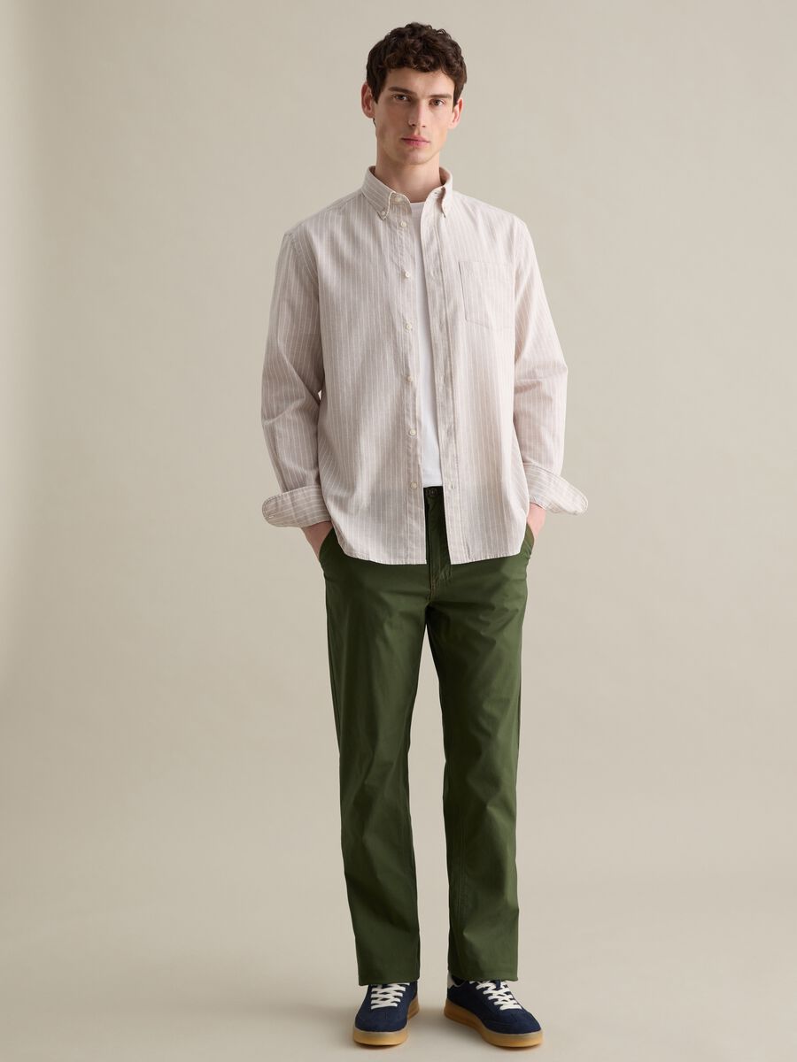 Green chino trousers in stretch cotton with pockets_0