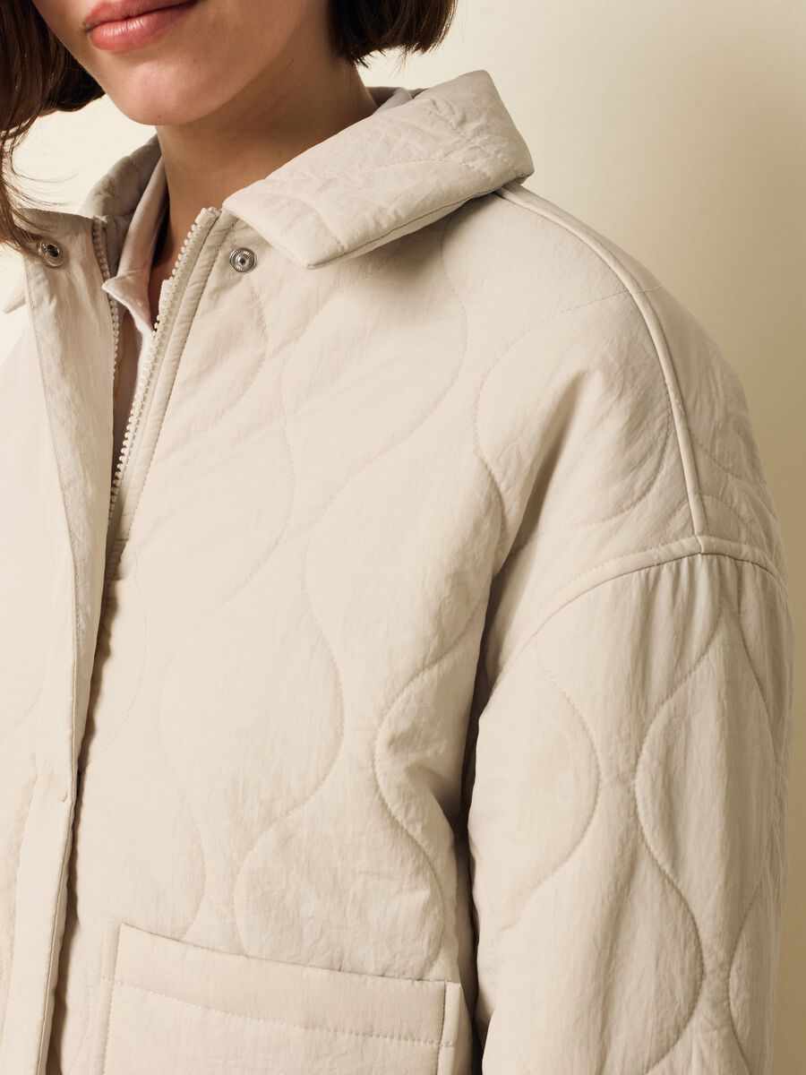 Short quilted jacket with buttons_2
