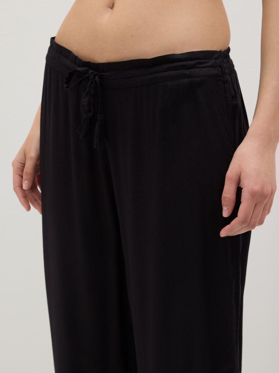 Long black beach cover-up trousers with drawstring_2