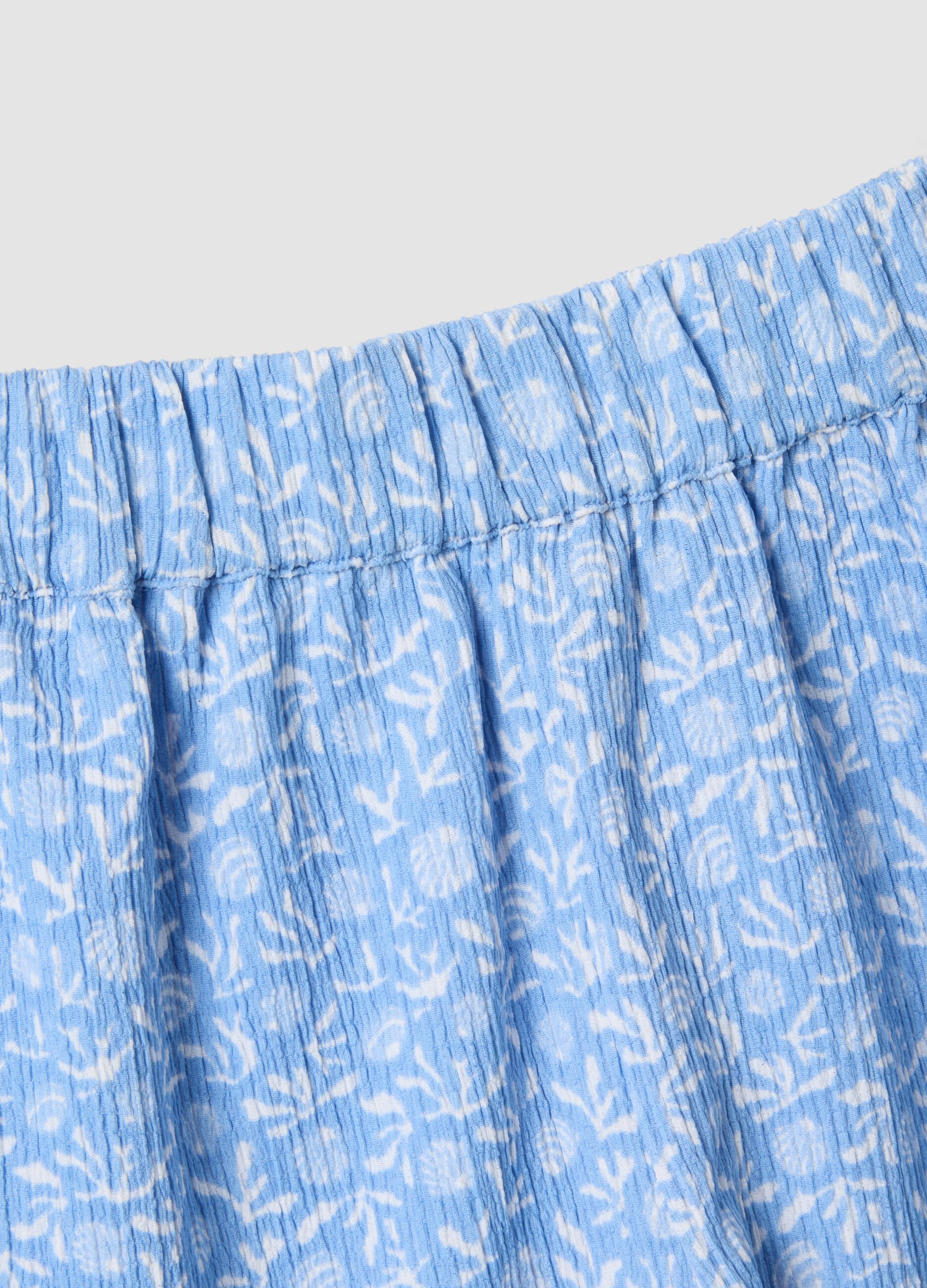 Blue stretch fabric set with sleeveless top and shorts