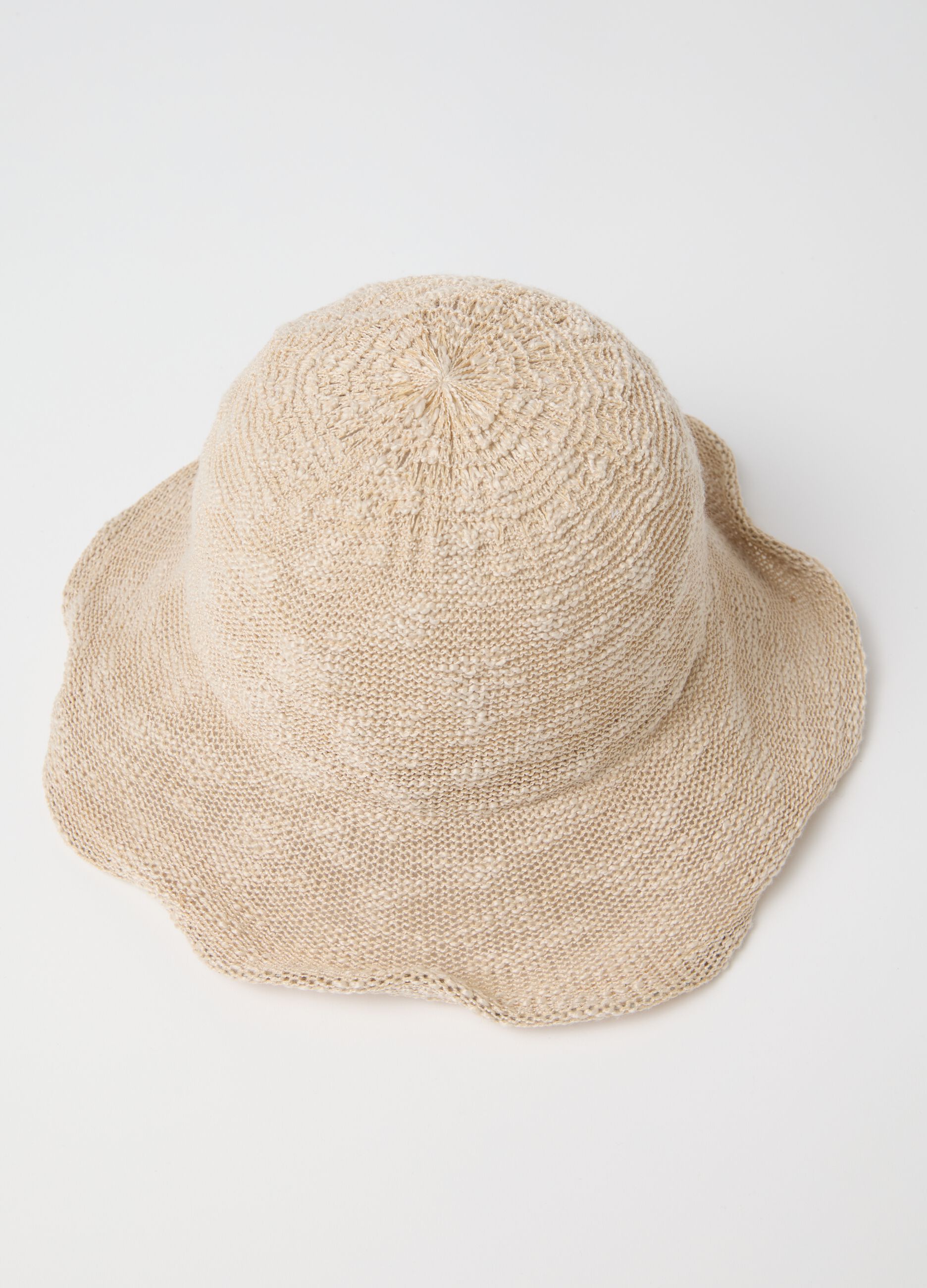 Beige cloche hat with knitted design