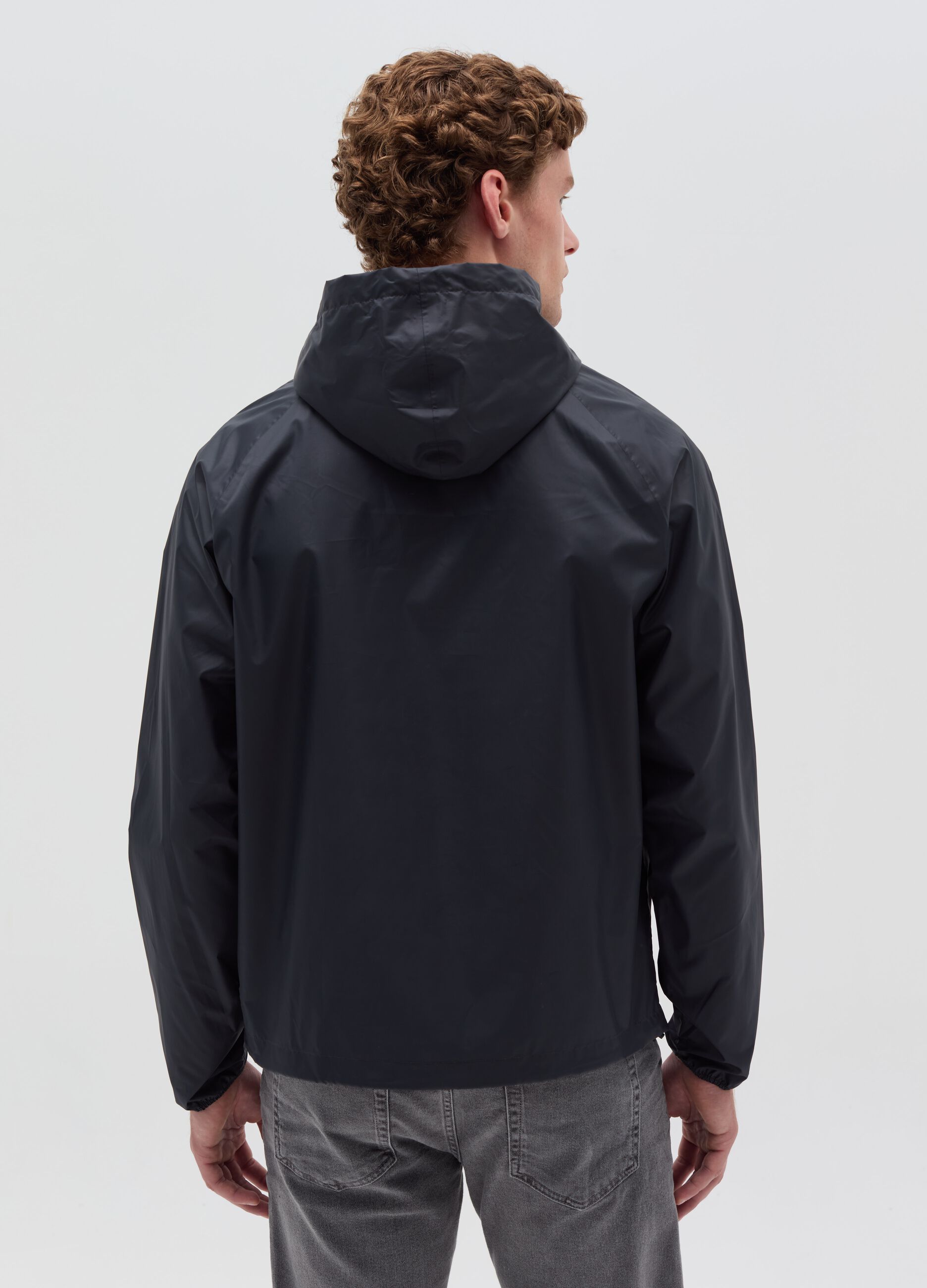 Giacca Essential impermeabile half-zip