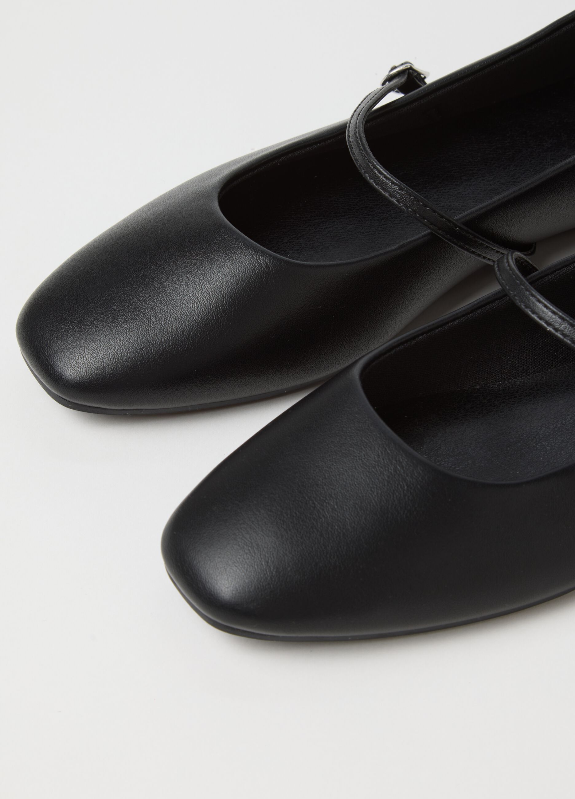 Black ballet flats with strap