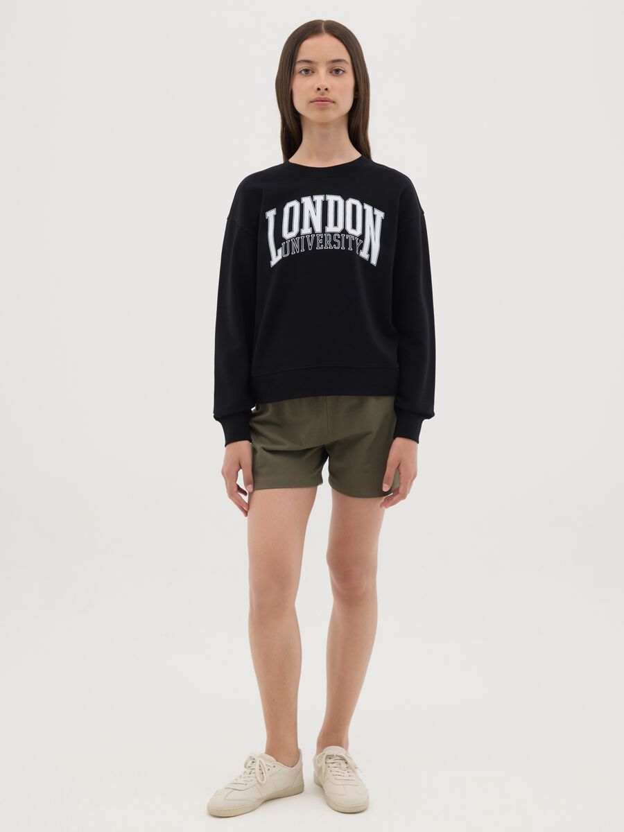 Shorts verdi in cotone con coulisse_0