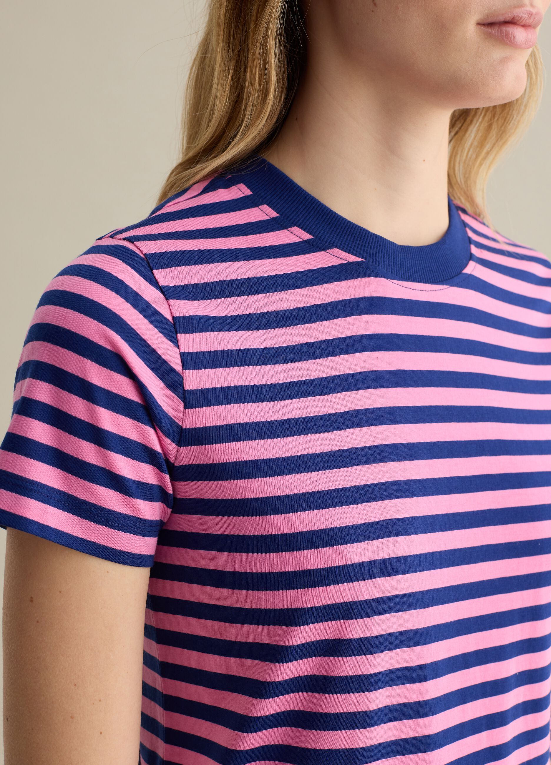 Pink and blue striped T-shirt with short sleeves