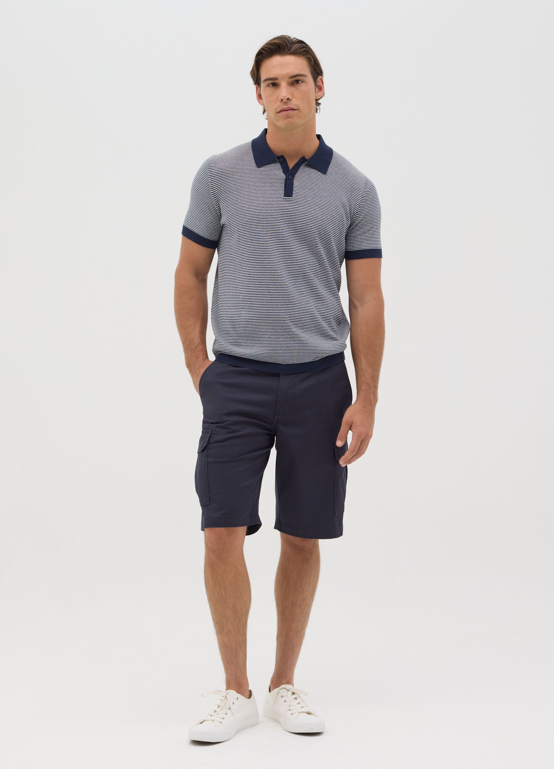 Polo in cotone a righe bianche e blu