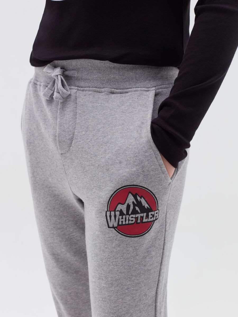 Joggers with drawstring and "Whistler" print_1