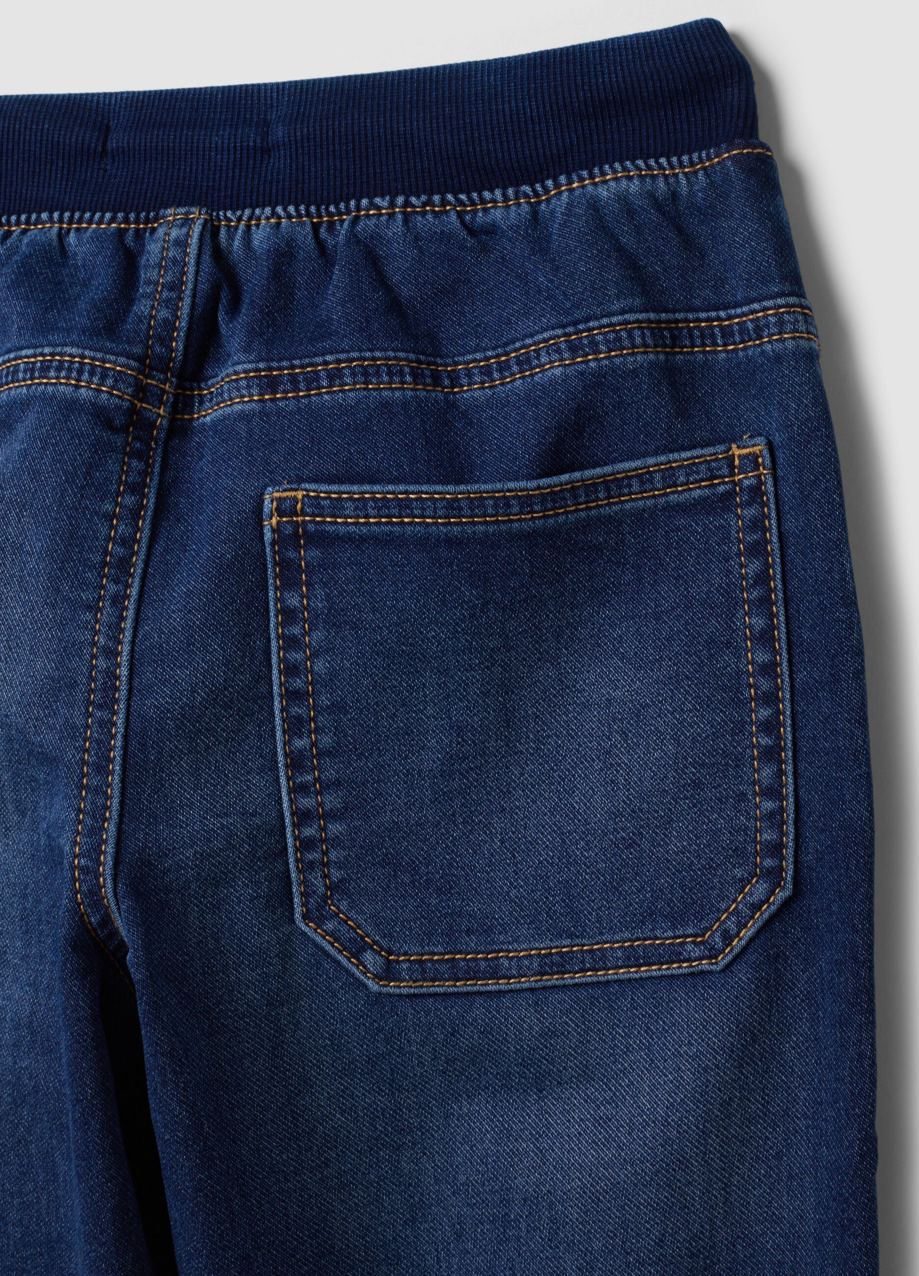 Jogger denim blu in cotone elasticizzato con vita elasticizzata per bambino