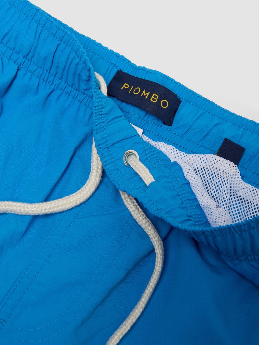 Boxer da mare azzurri con vita elasticizzata e coulisse_1
