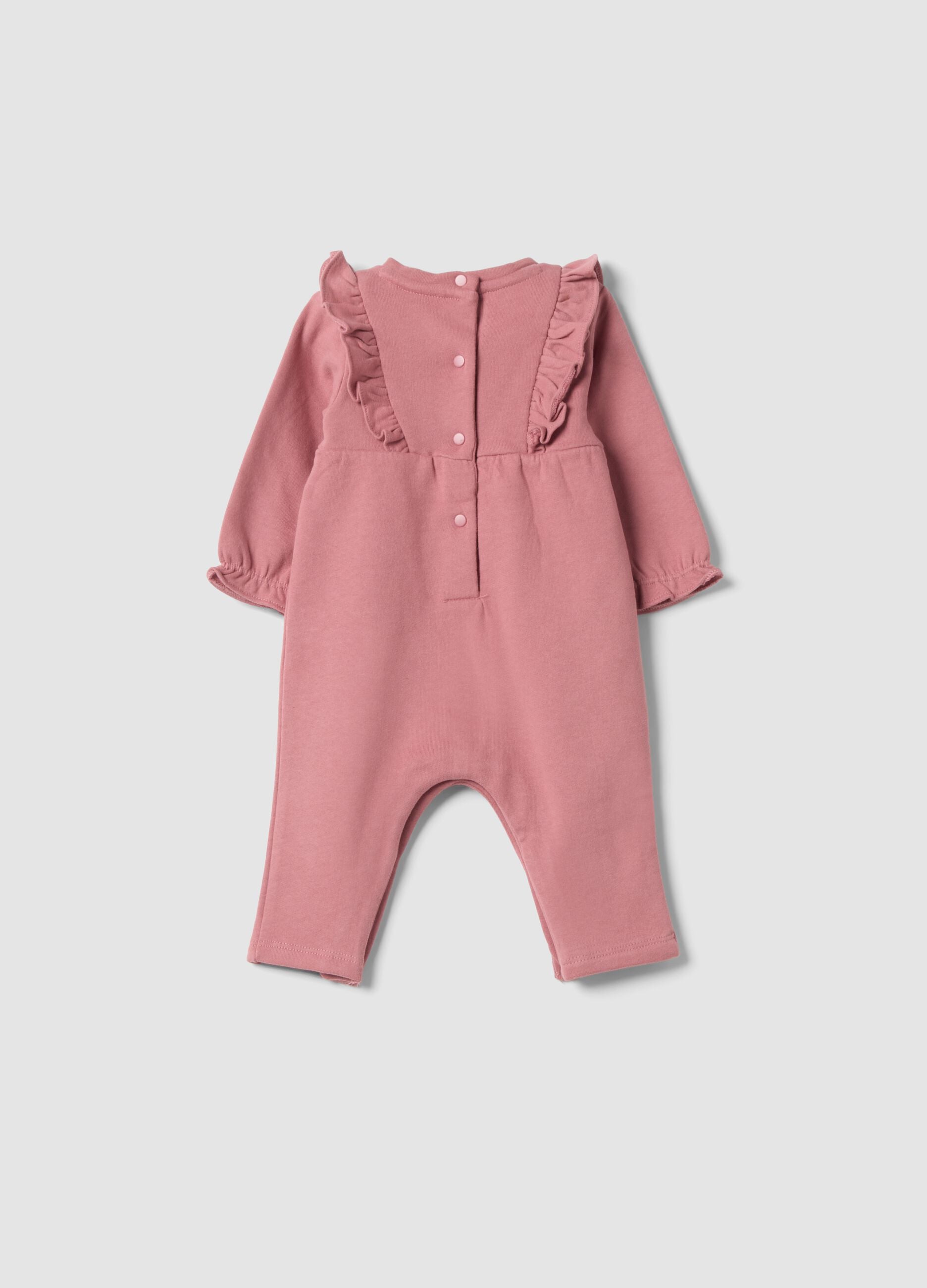 Pink organic cotton sleepsuit with ruffles and chest embroidery