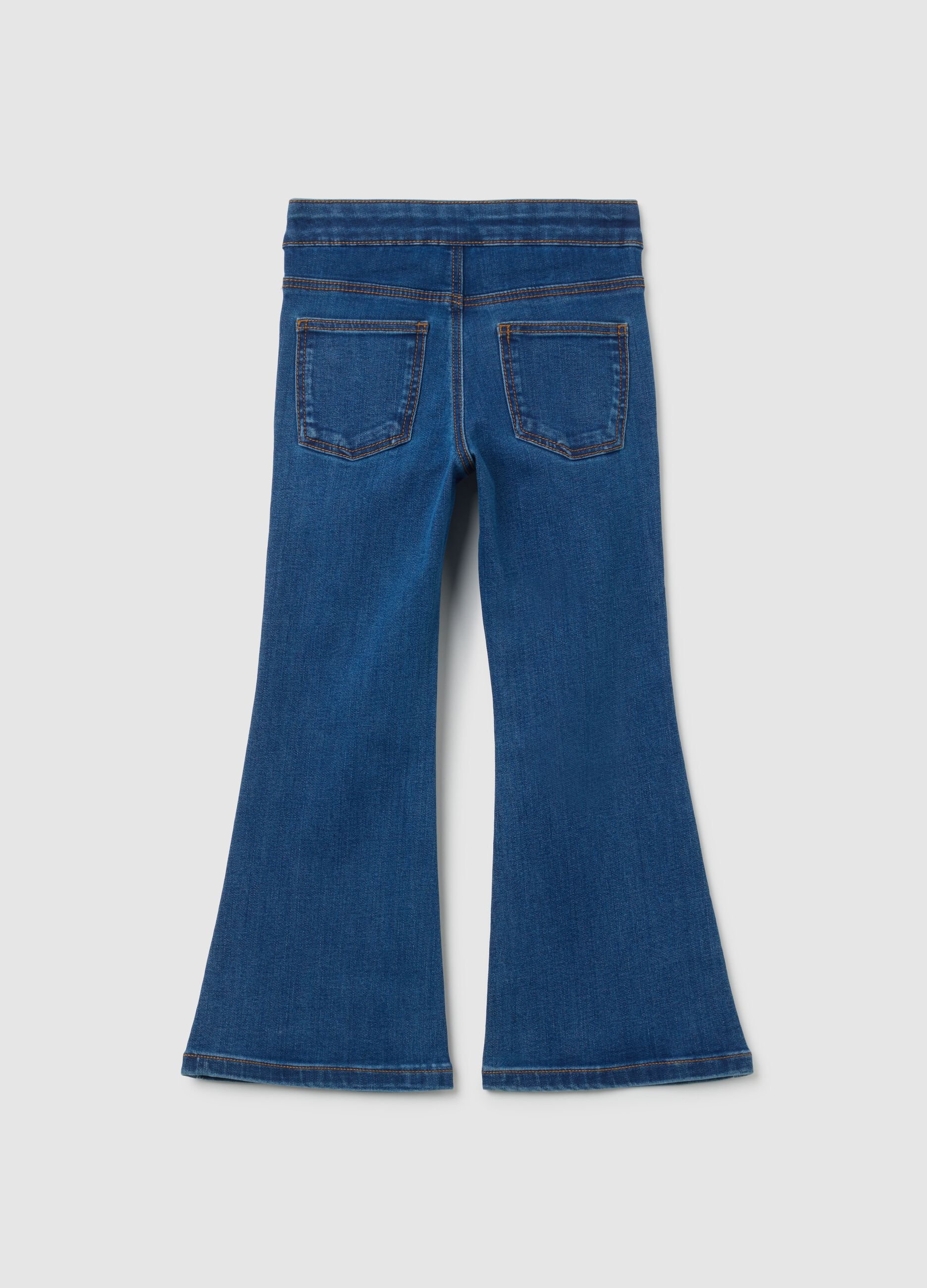 Jeans da bambina in denim blu flare