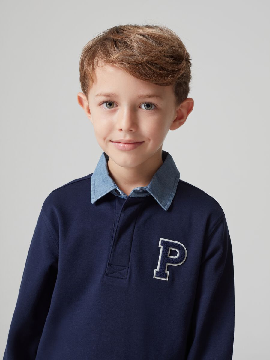 Polo a maniche lunghe con patch boucle_1