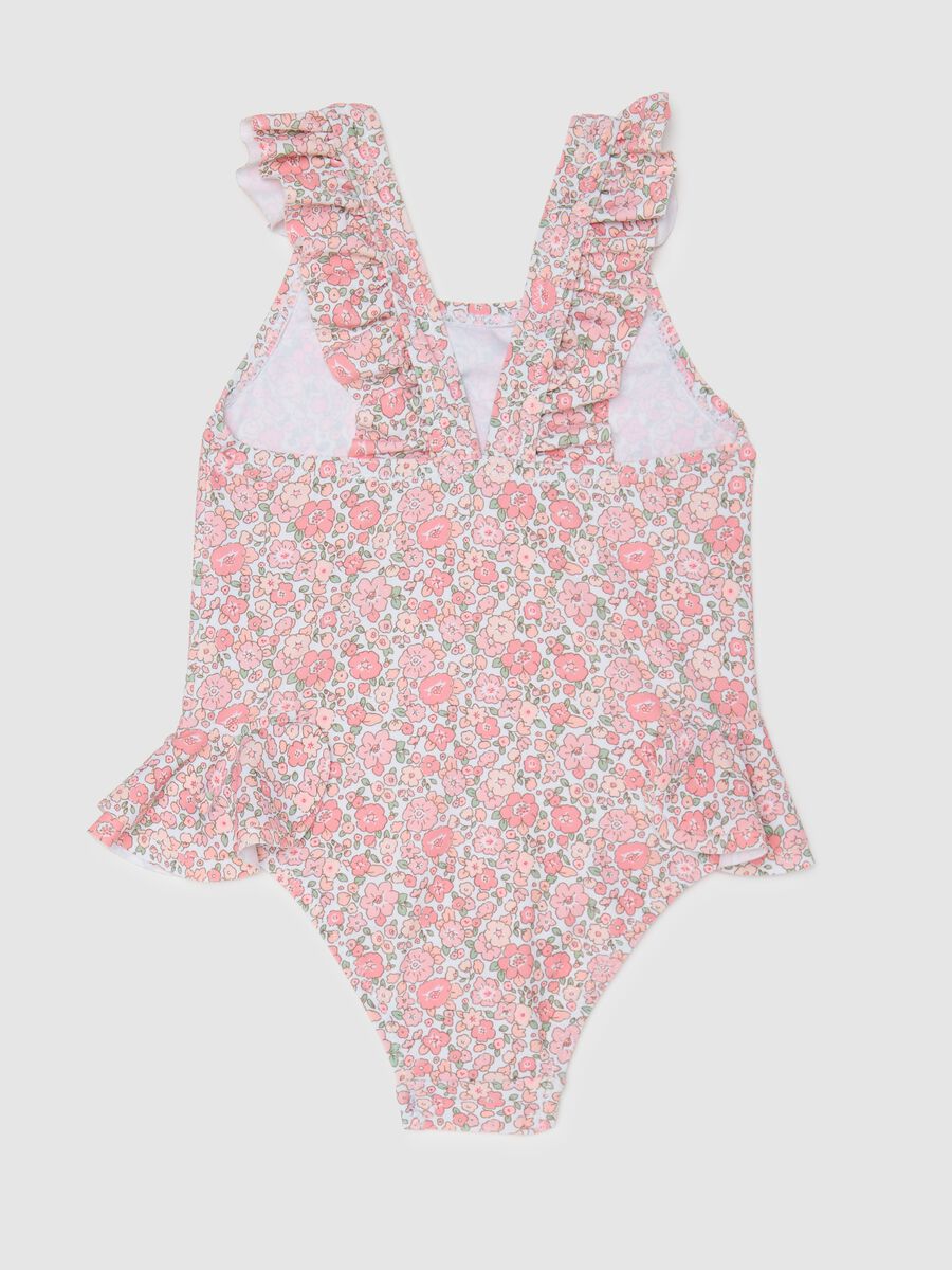 Girls’ one-piece swimsuit in multicoloured stretch fabric_1
