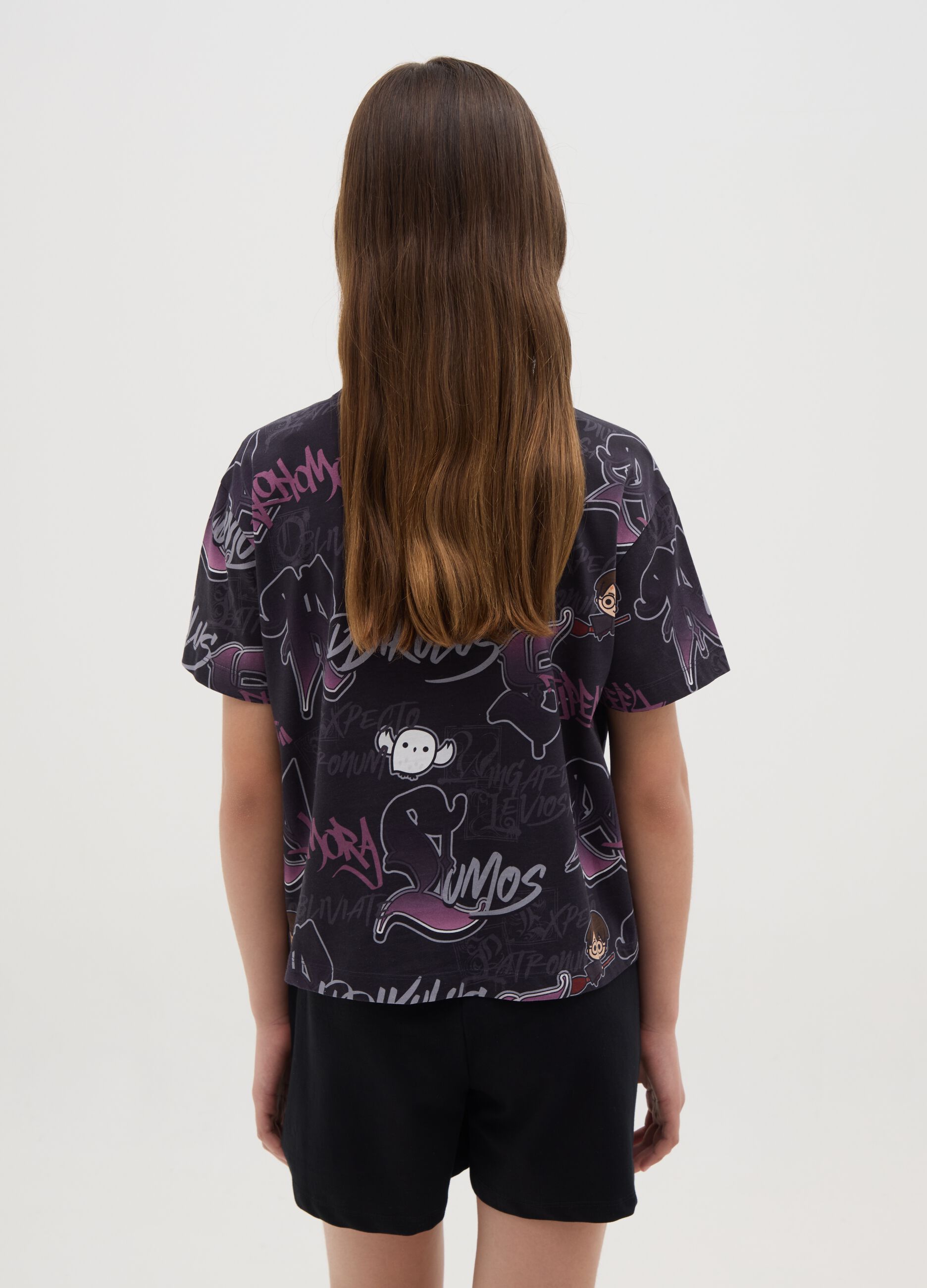 Girls’ oversized black T-shirt in 100% cotton with bold pattern
