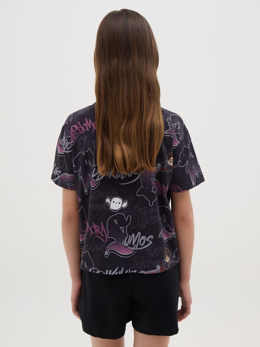 Girls’ oversized black T-shirt in 100% cotton with bold pattern_2